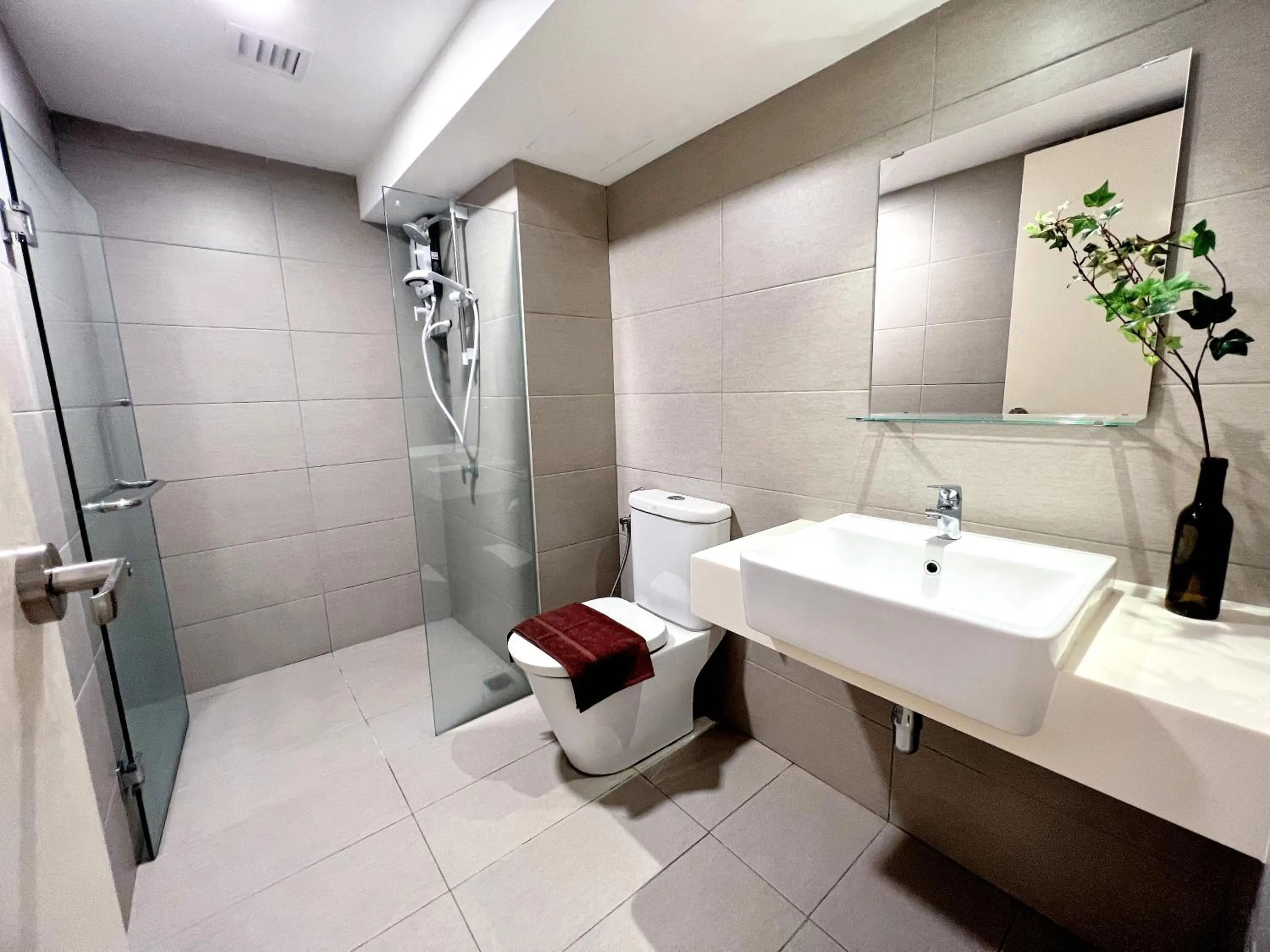 Shower in EkoCheras Suite by MOKA