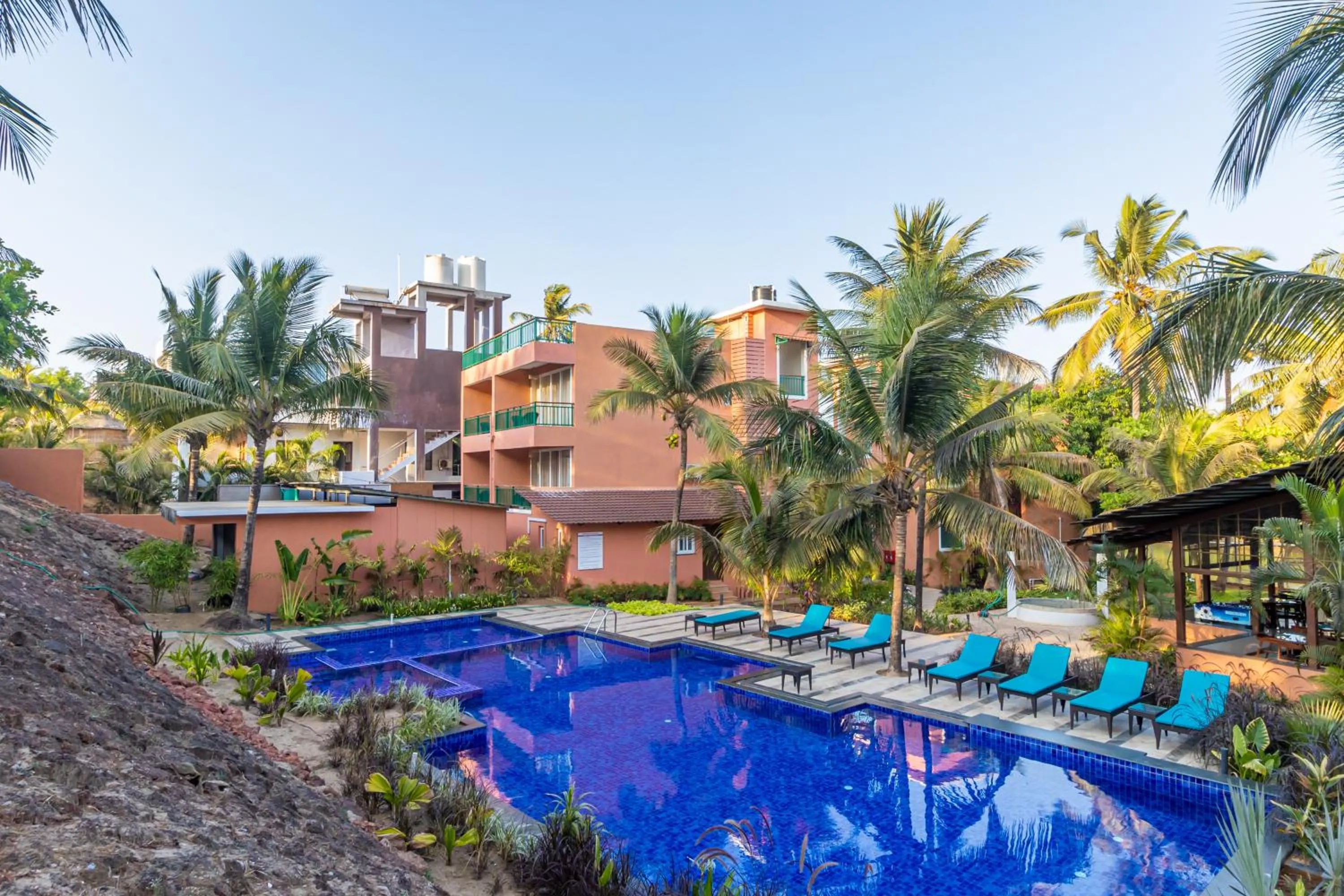Swimming pool in Mandrem Beach Resort, a member of Radisson Individuals Retreat