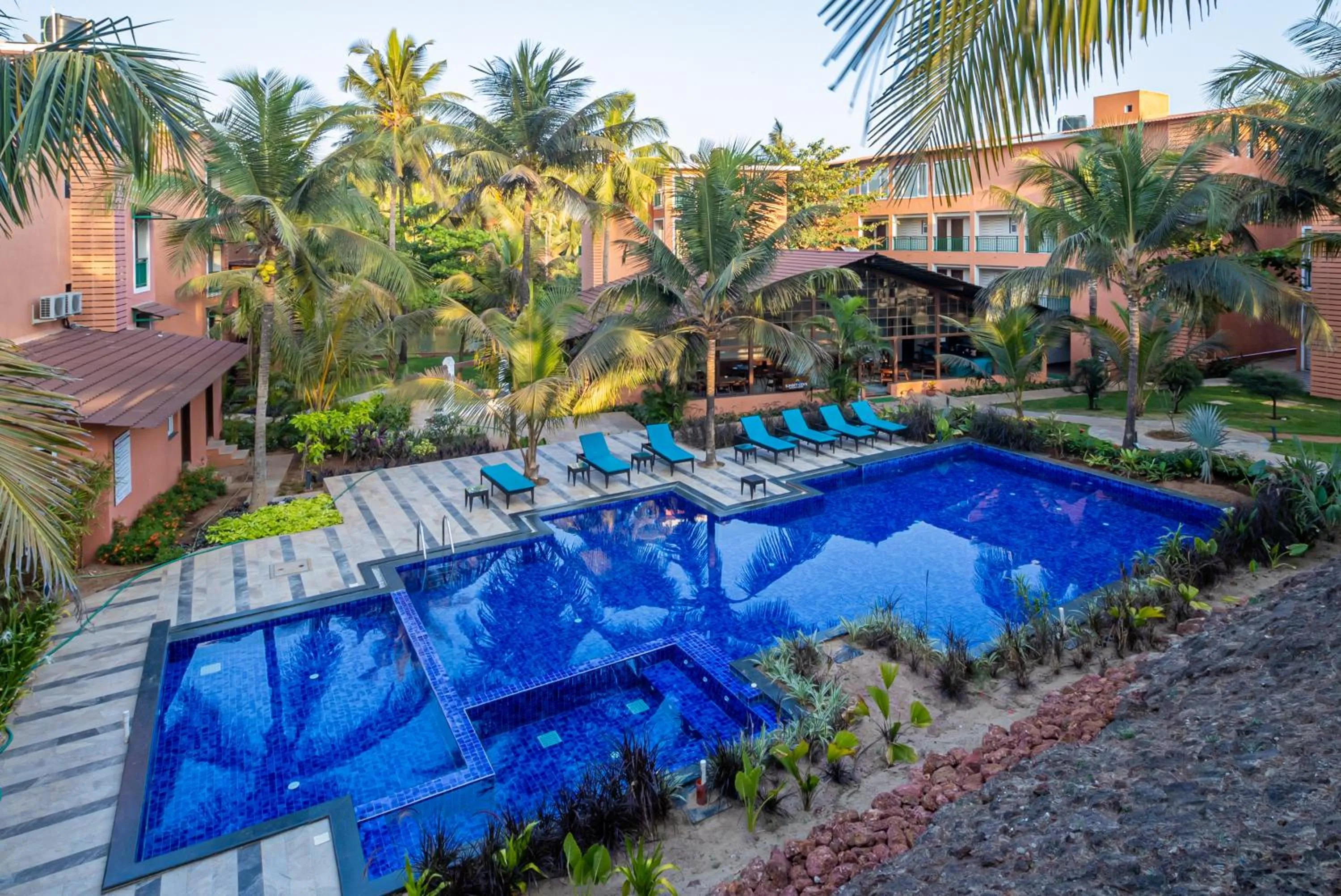 Swimming pool in Mandrem Beach Resort, a member of Radisson Individuals Retreat
