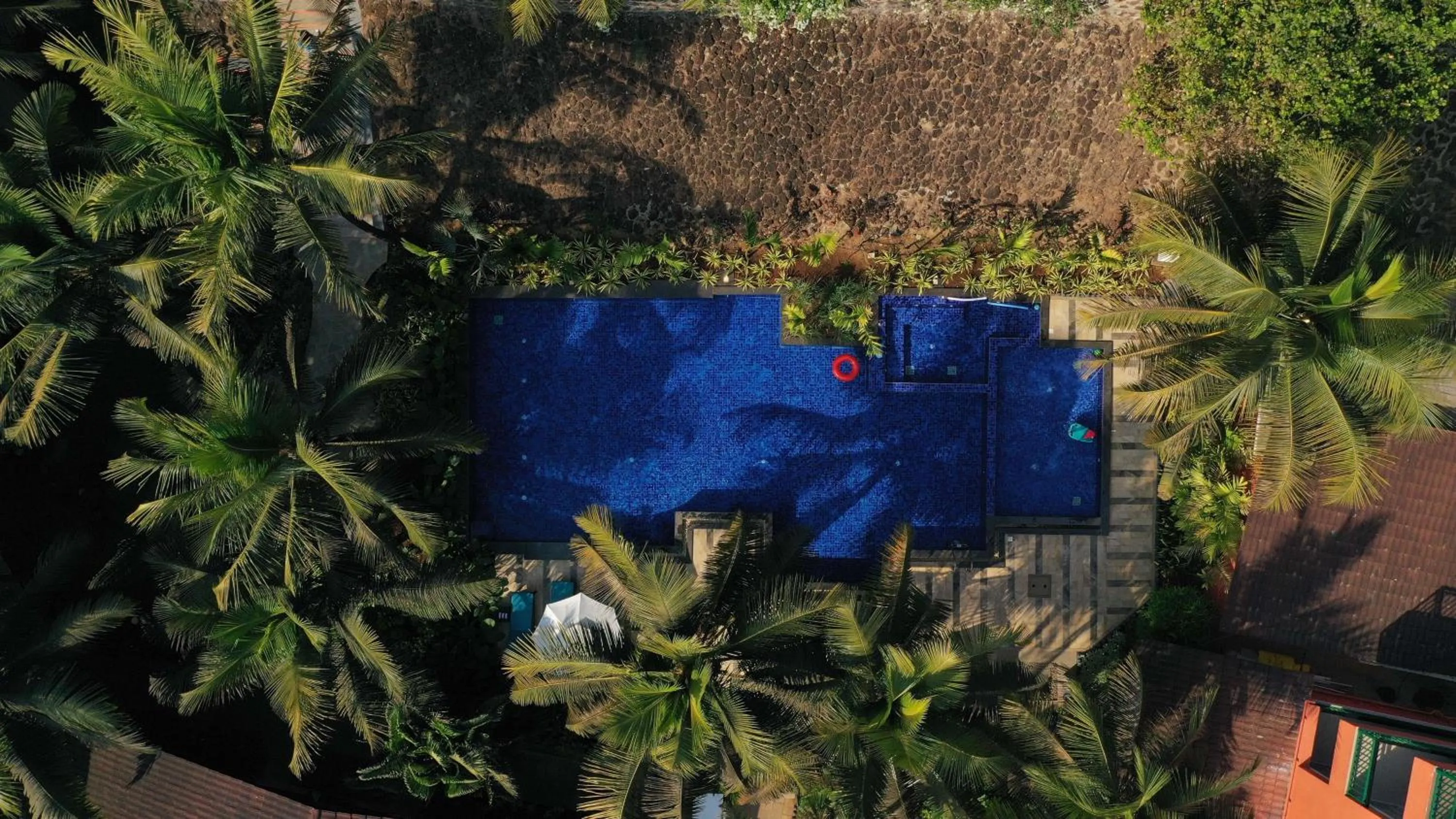 Pool view in Mandrem Beach Resort, a member of Radisson Individuals Retreat