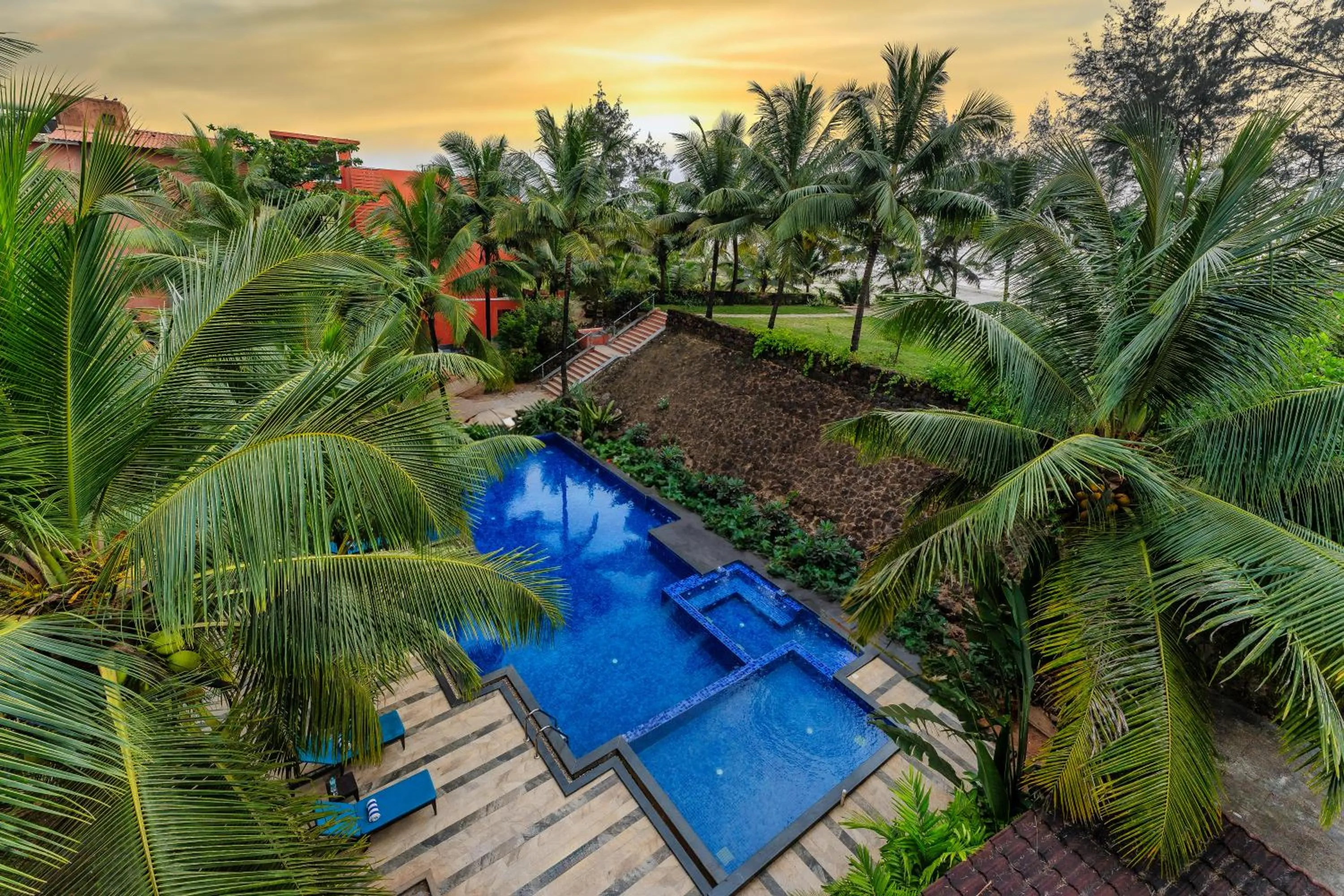 Swimming pool in Mandrem Beach Resort, a member of Radisson Individuals Retreat
