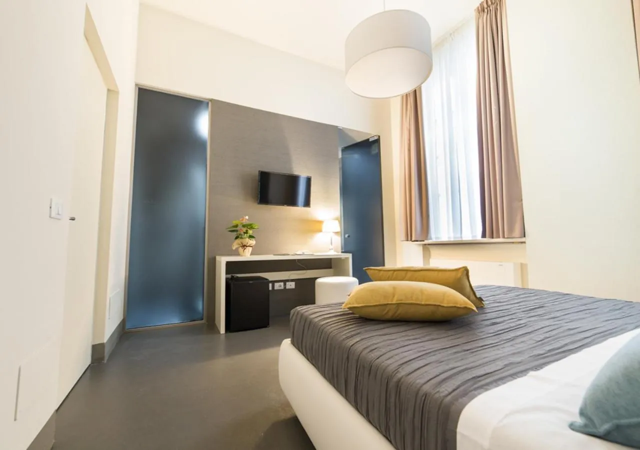 Bed in LUCUS Exclusive Bed and Breakfast