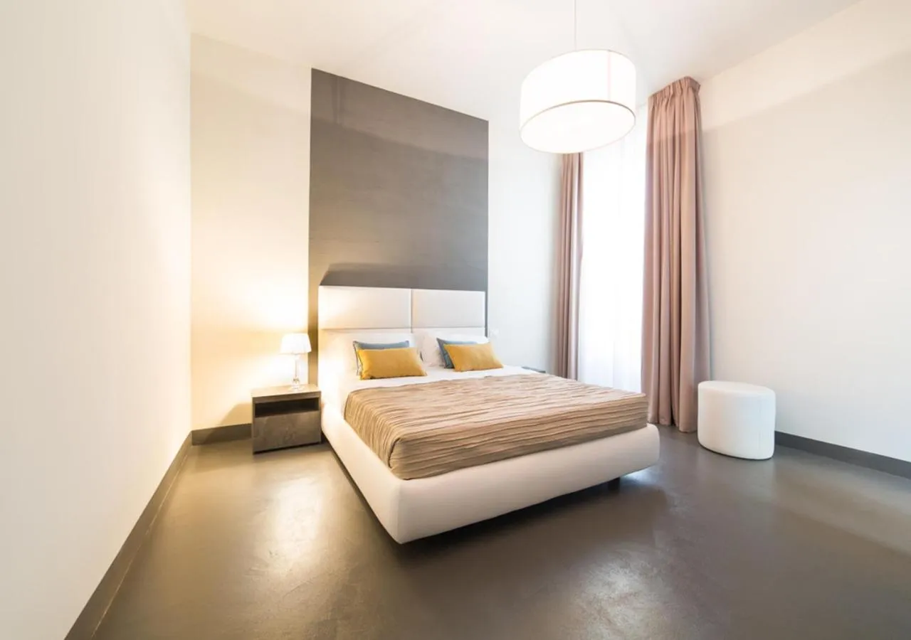 Bed in LUCUS Exclusive Bed and Breakfast