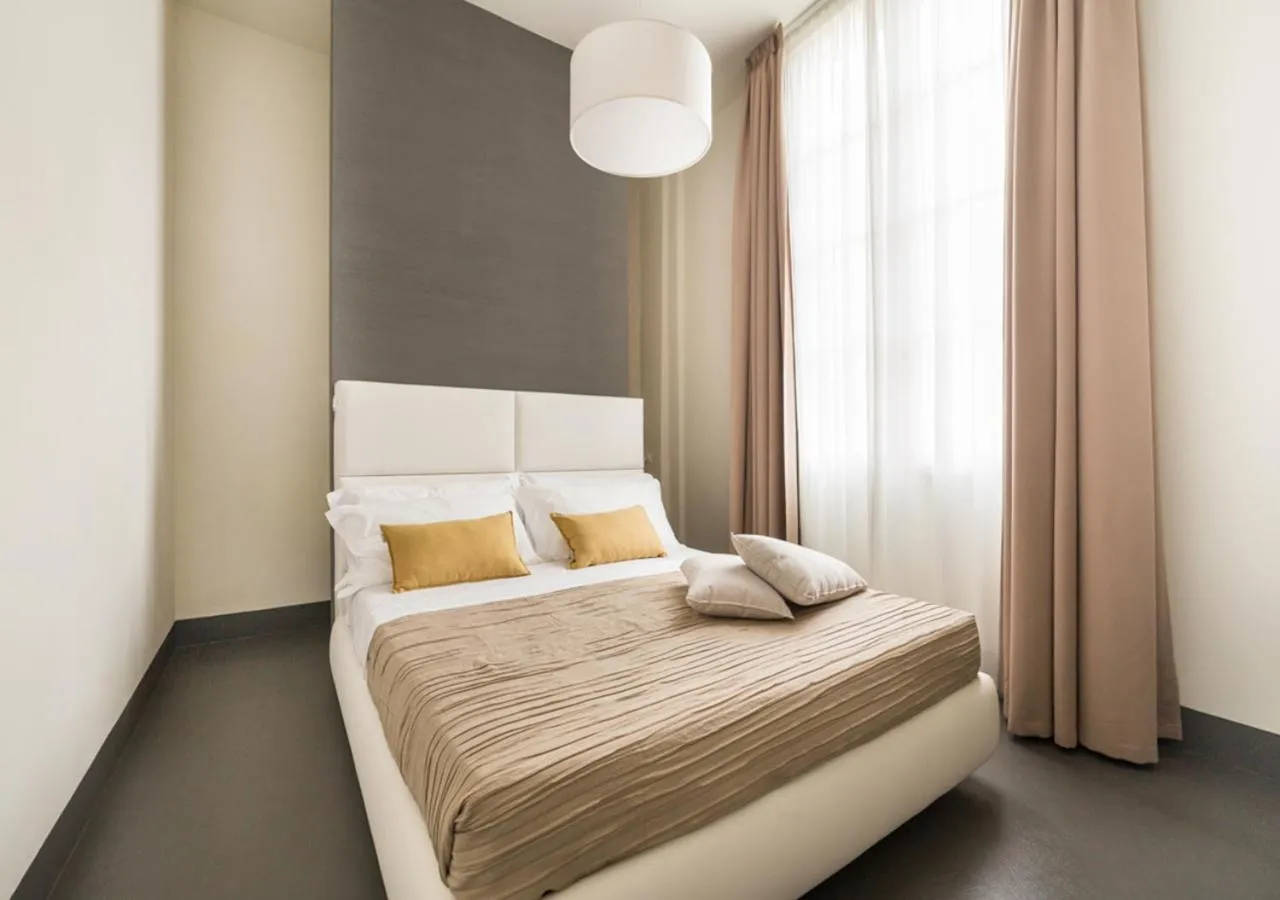 Bed in LUCUS Exclusive Bed and Breakfast