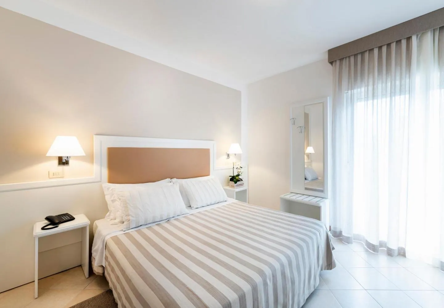 Bed in Hotel Andreaneri