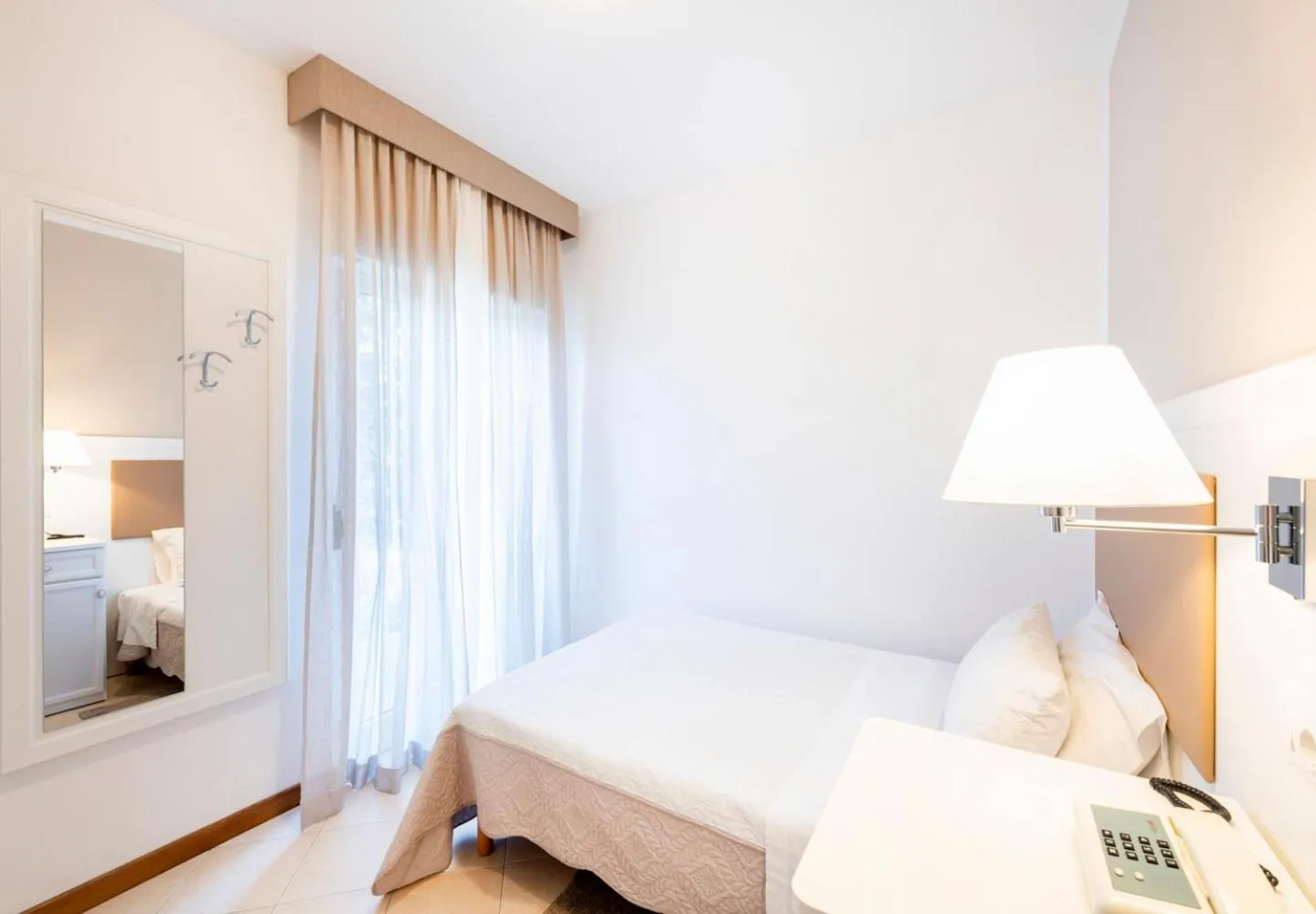 Bed in Hotel Andreaneri