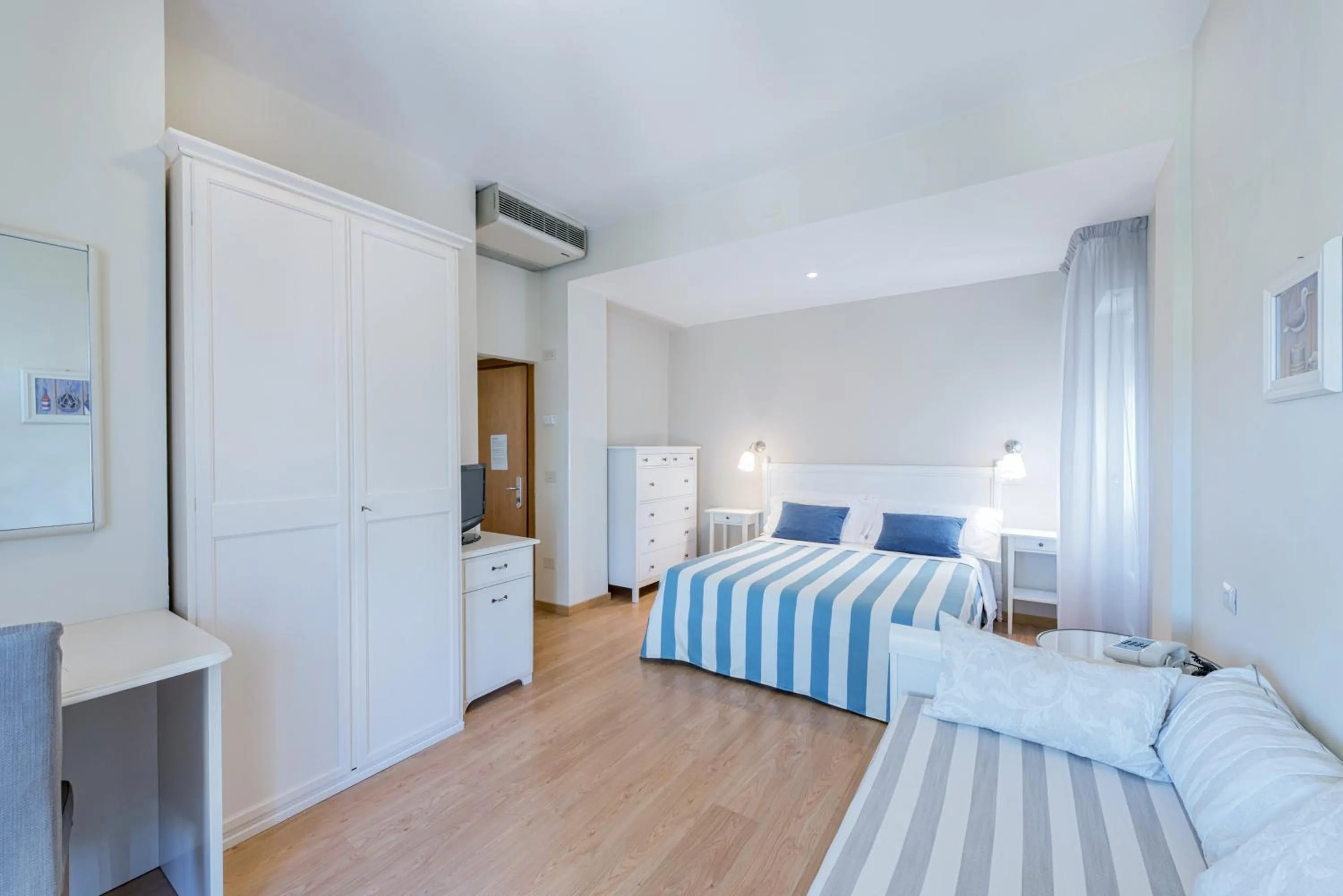 Bed in Hotel Andreaneri