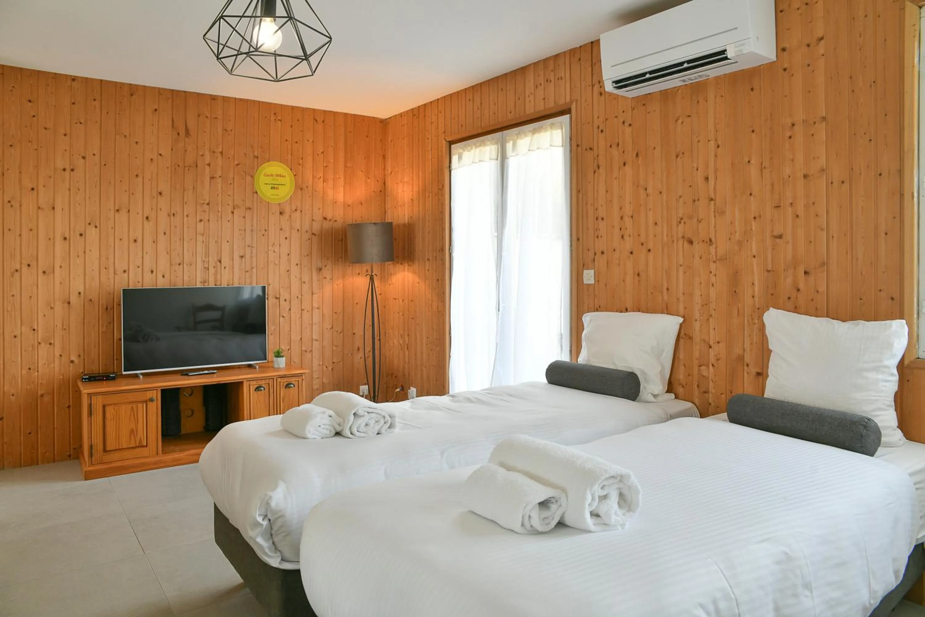 Bed in Les Villas du Domaine de Suzel