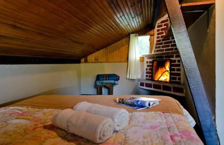 Bed in Pousada da Gruta