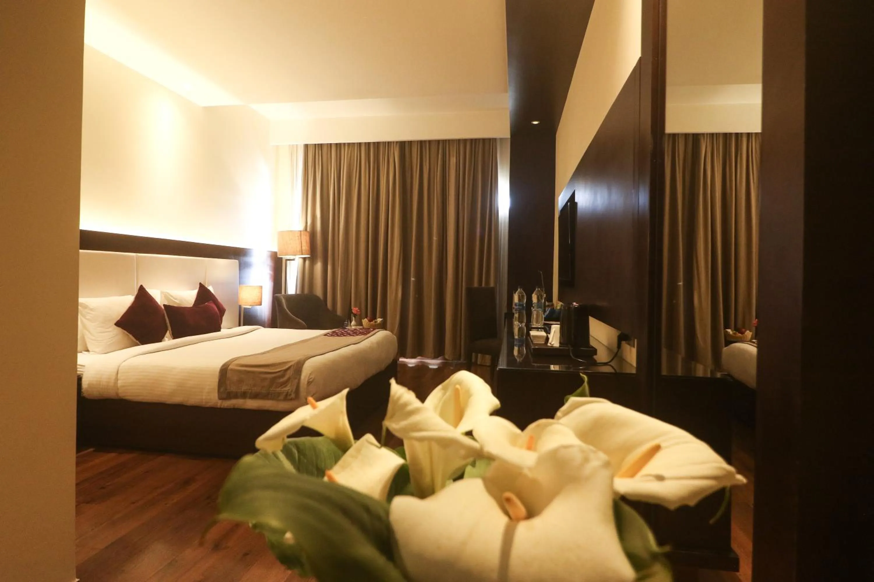 Photo of the whole room, Bed in Marigold Sarovar Portico Shimla