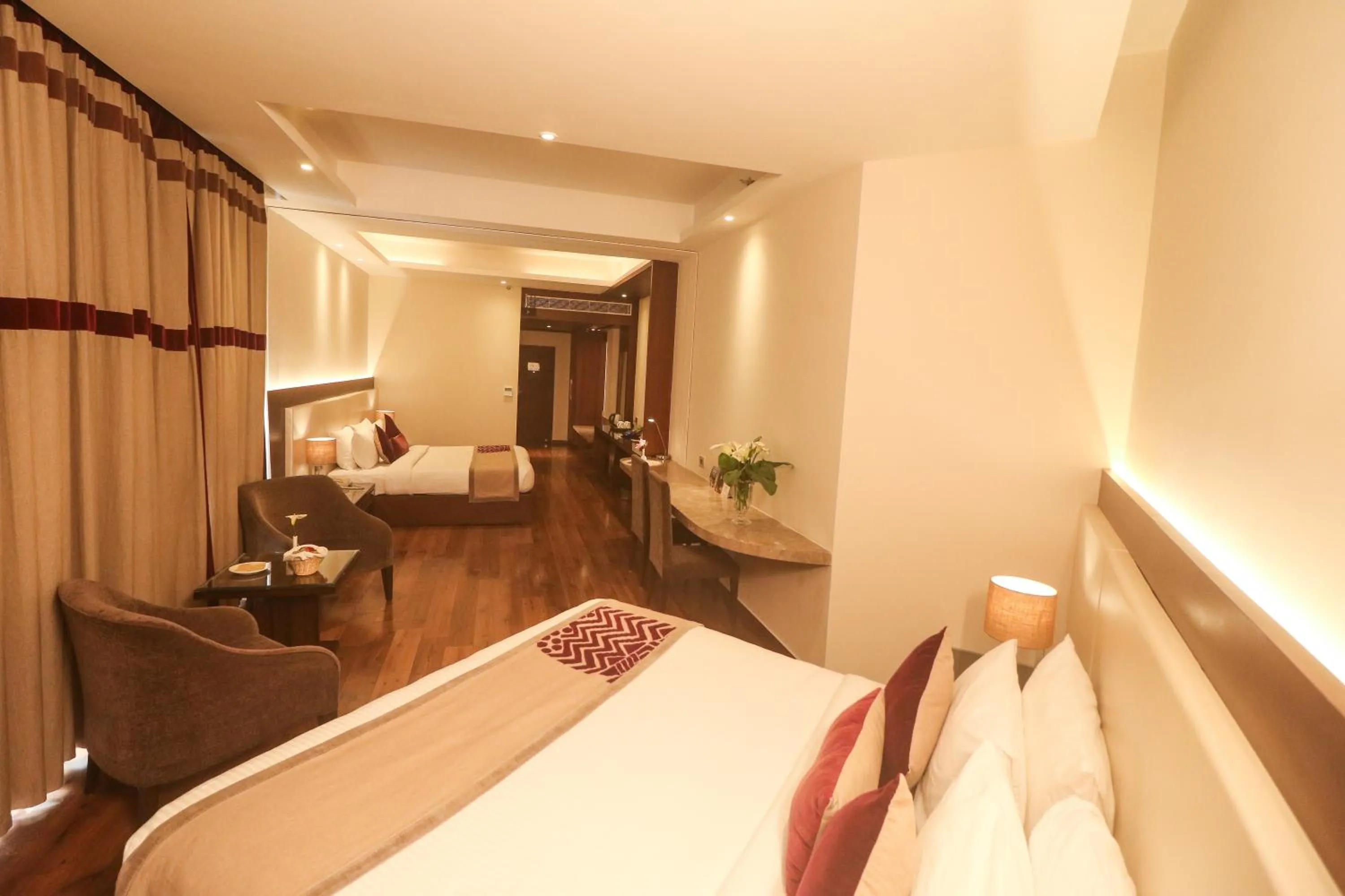 Photo of the whole room, Bed in Marigold Sarovar Portico Shimla