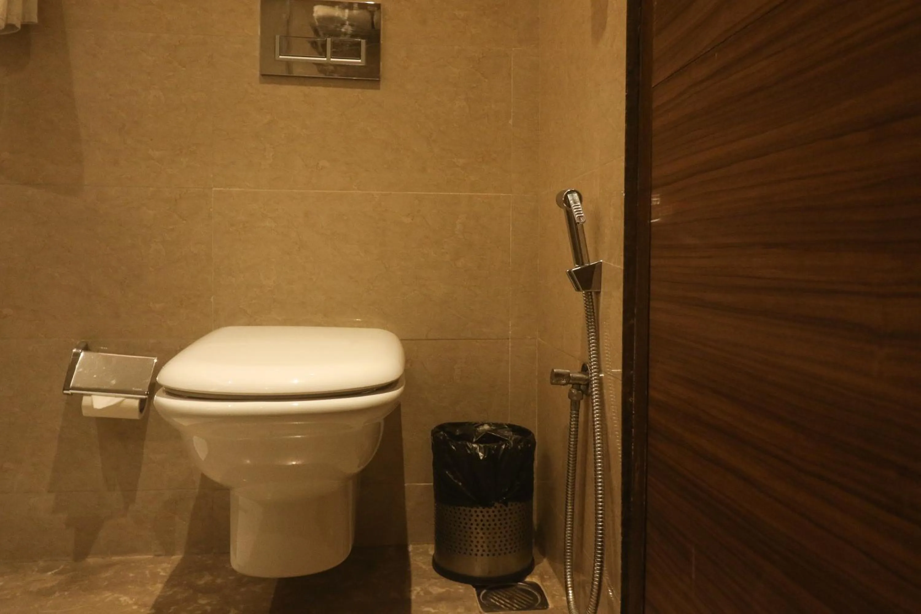 Toilet in Marigold Sarovar Portico Shimla