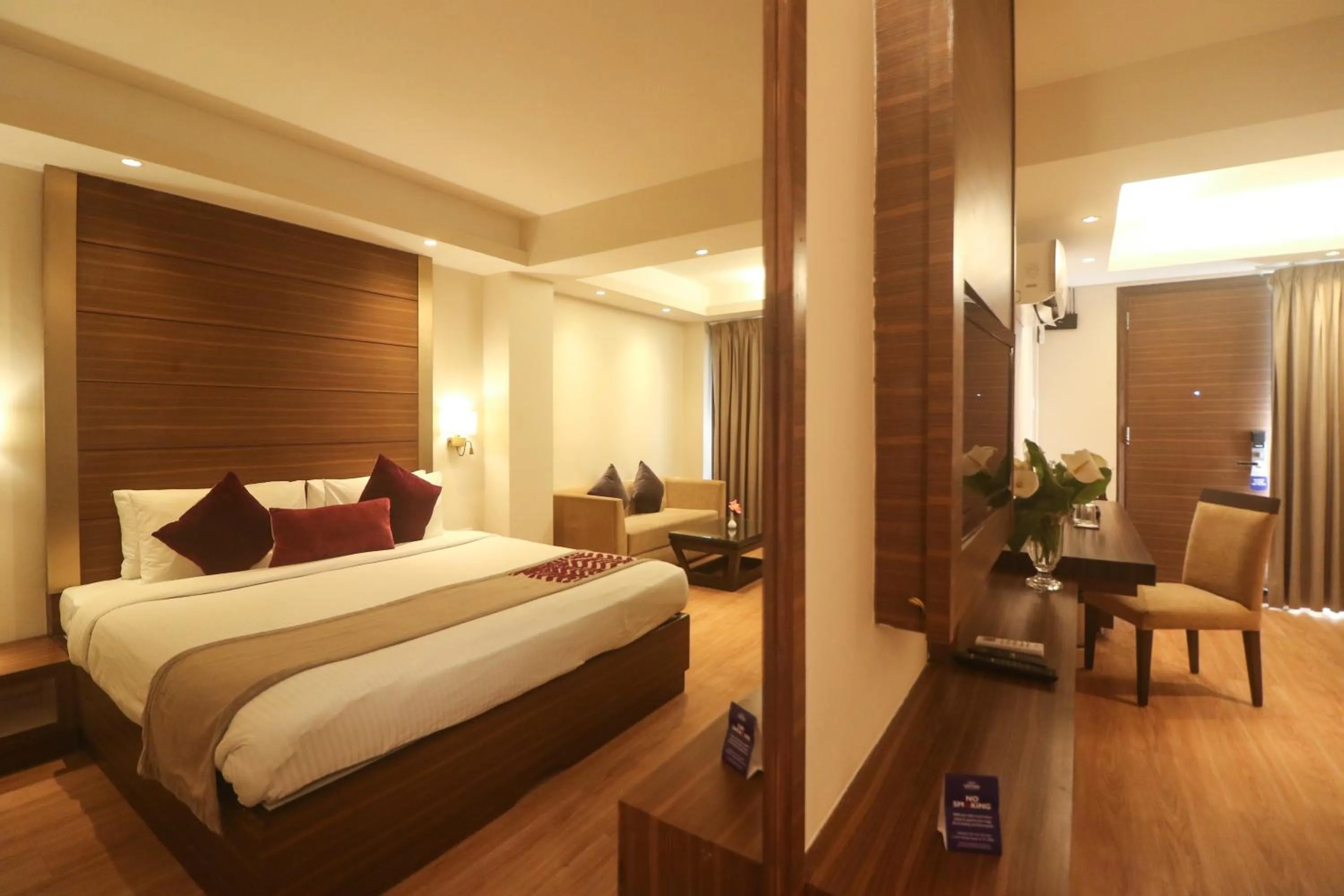 Photo of the whole room, Bed in Marigold Sarovar Portico Shimla