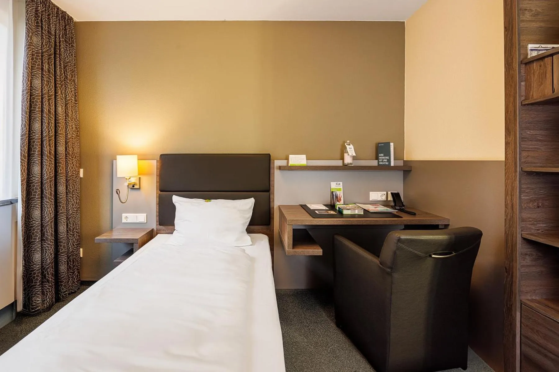 Photo of the whole room, Bed in GenoHotel Forsbach