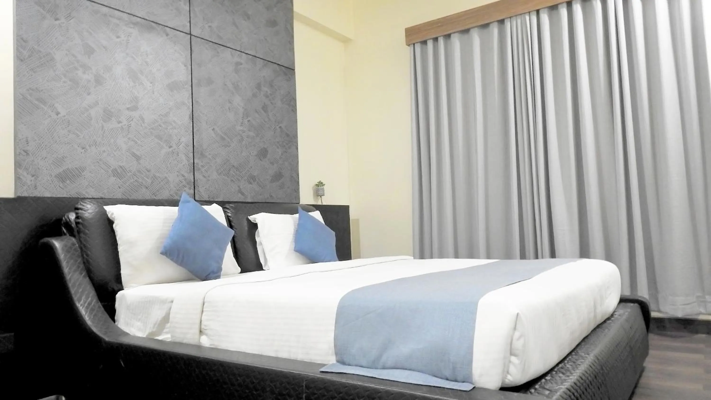 Bed in Hotel Sai Miracle