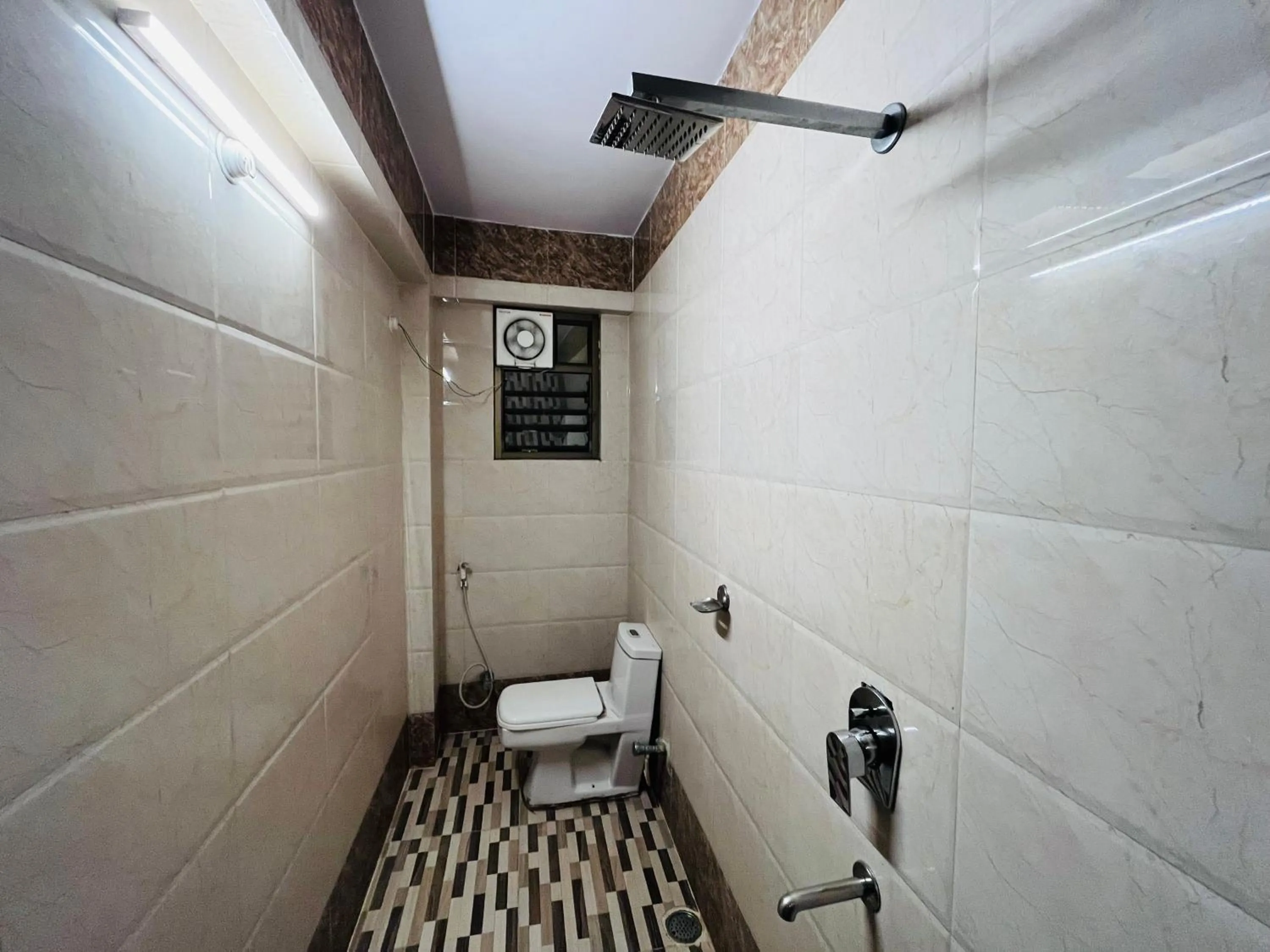 Shower in Hotel Mani International