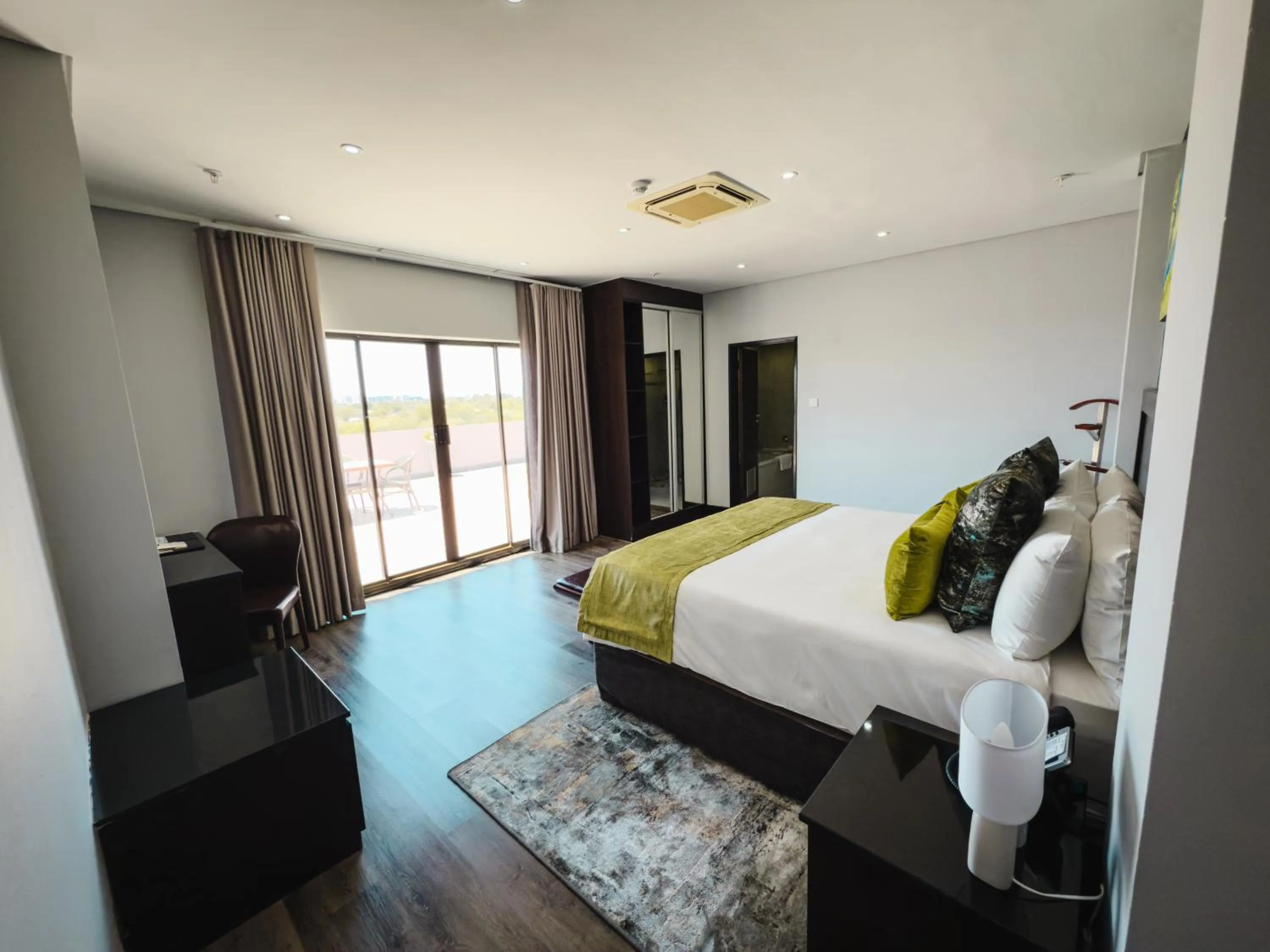 Bedroom in The Grand Aria Hotel and Conference Centre