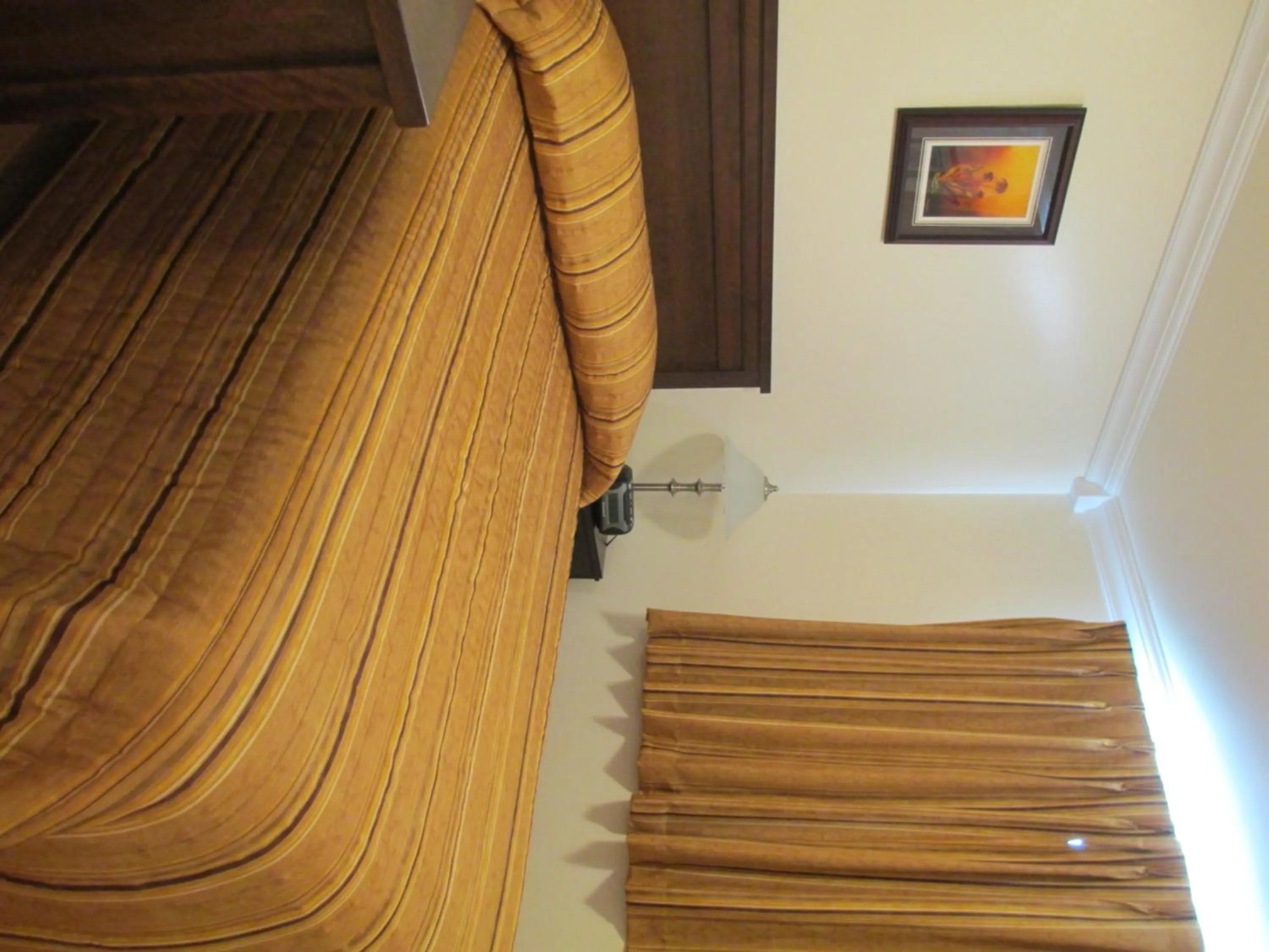 Bedroom in Comerford's Ocean View Suites