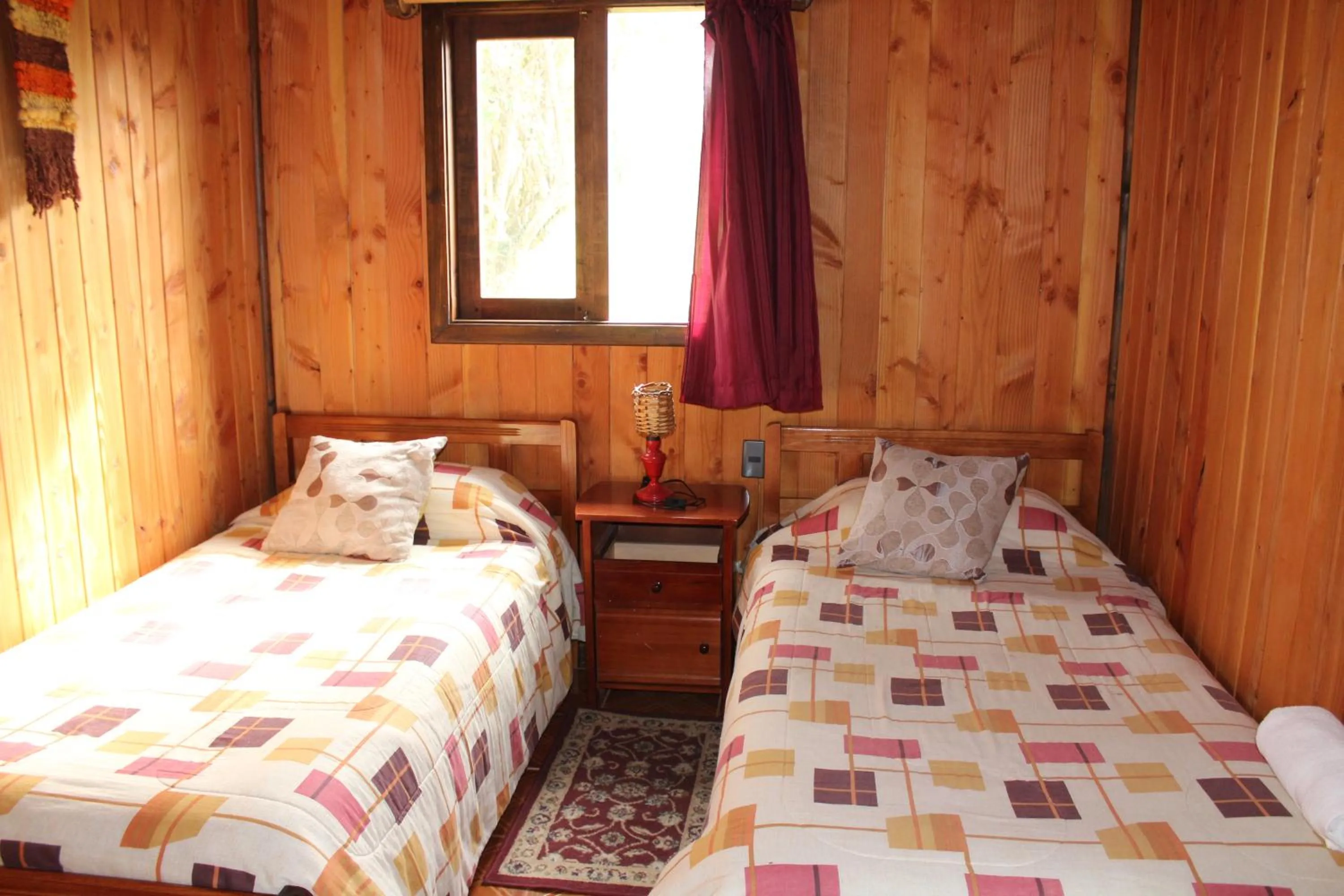 Bed in Apart hotel Puchaley Lafquen