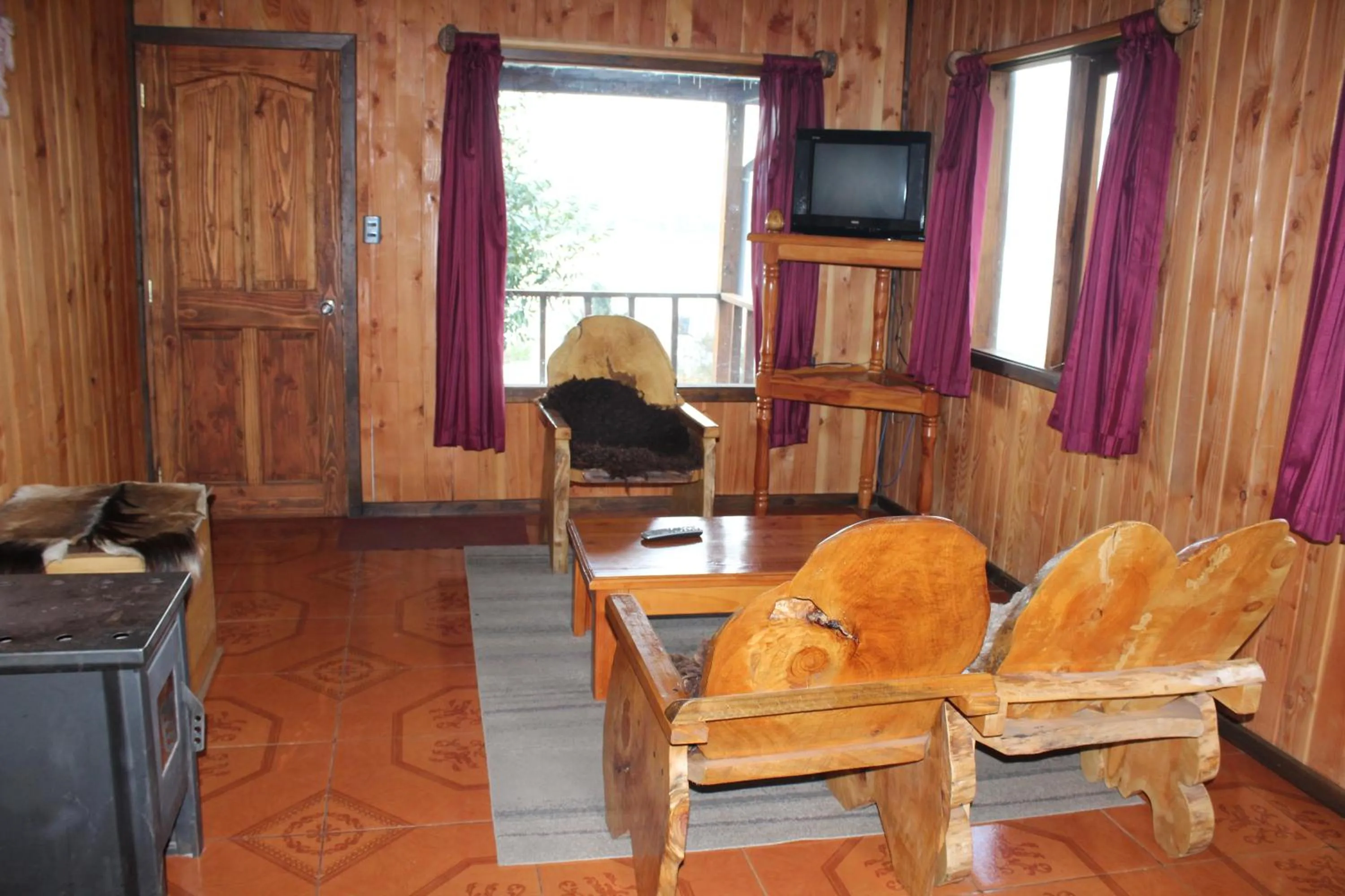 Seating area in Apart hotel Puchaley Lafquen