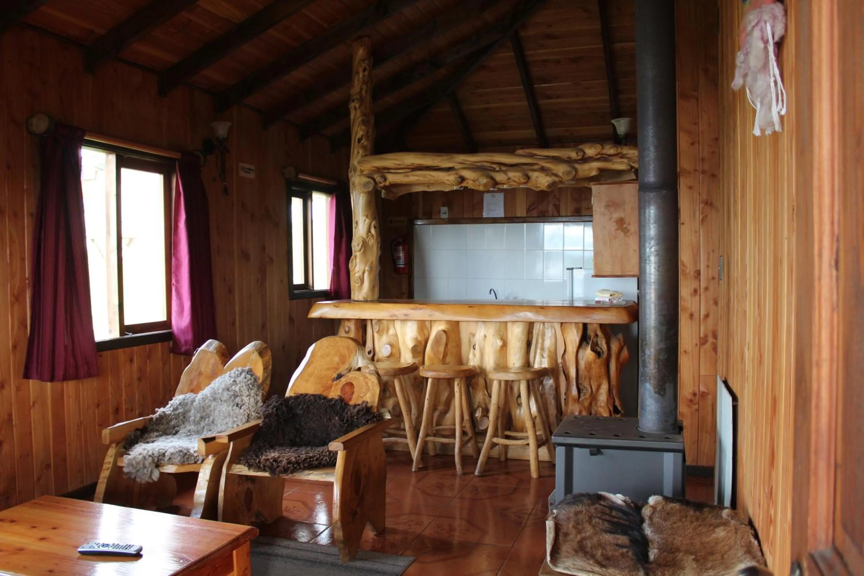 Kitchen or kitchenette in Apart hotel Puchaley Lafquen