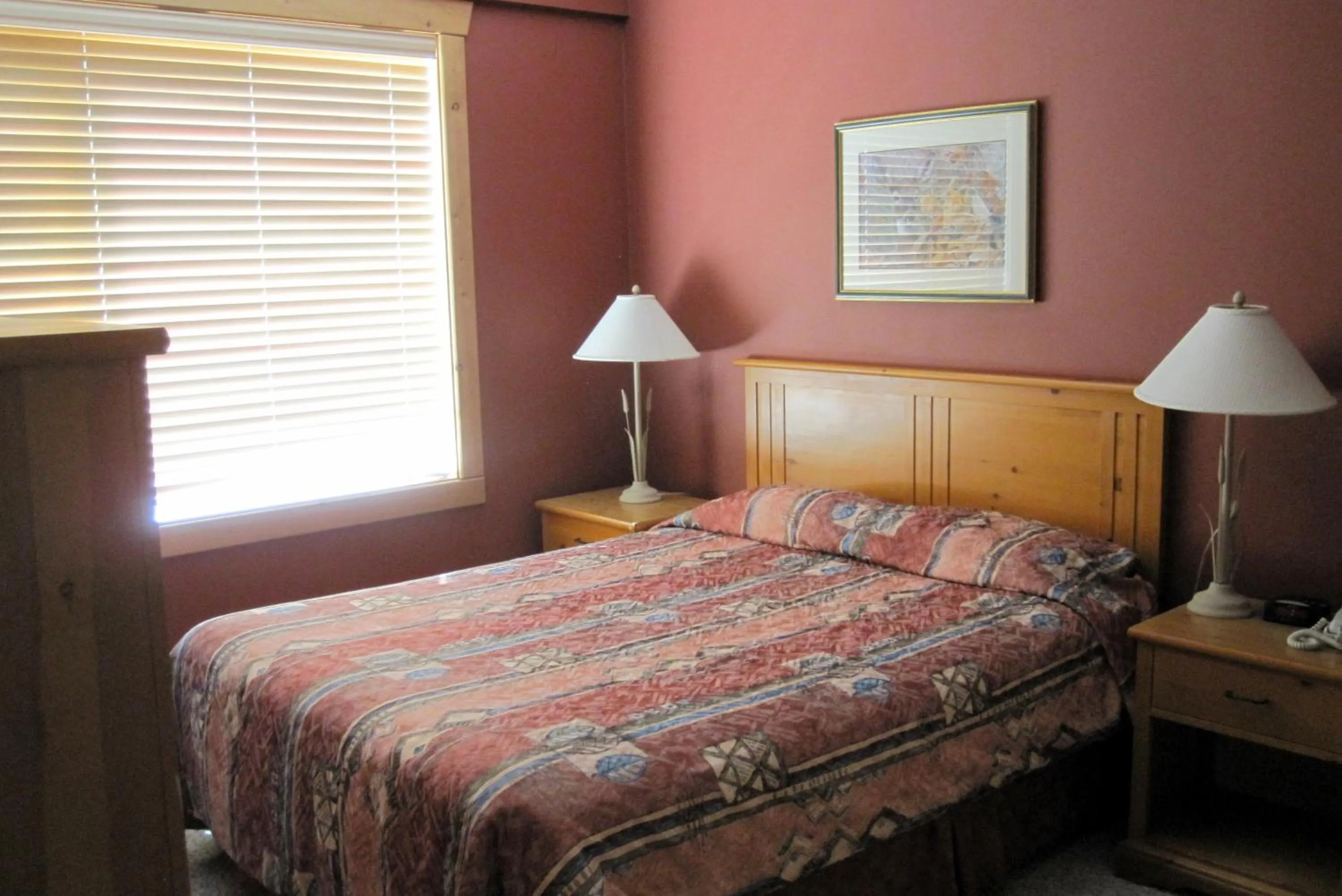 Bed in Cornerstone Lodge by Park Vacation Management