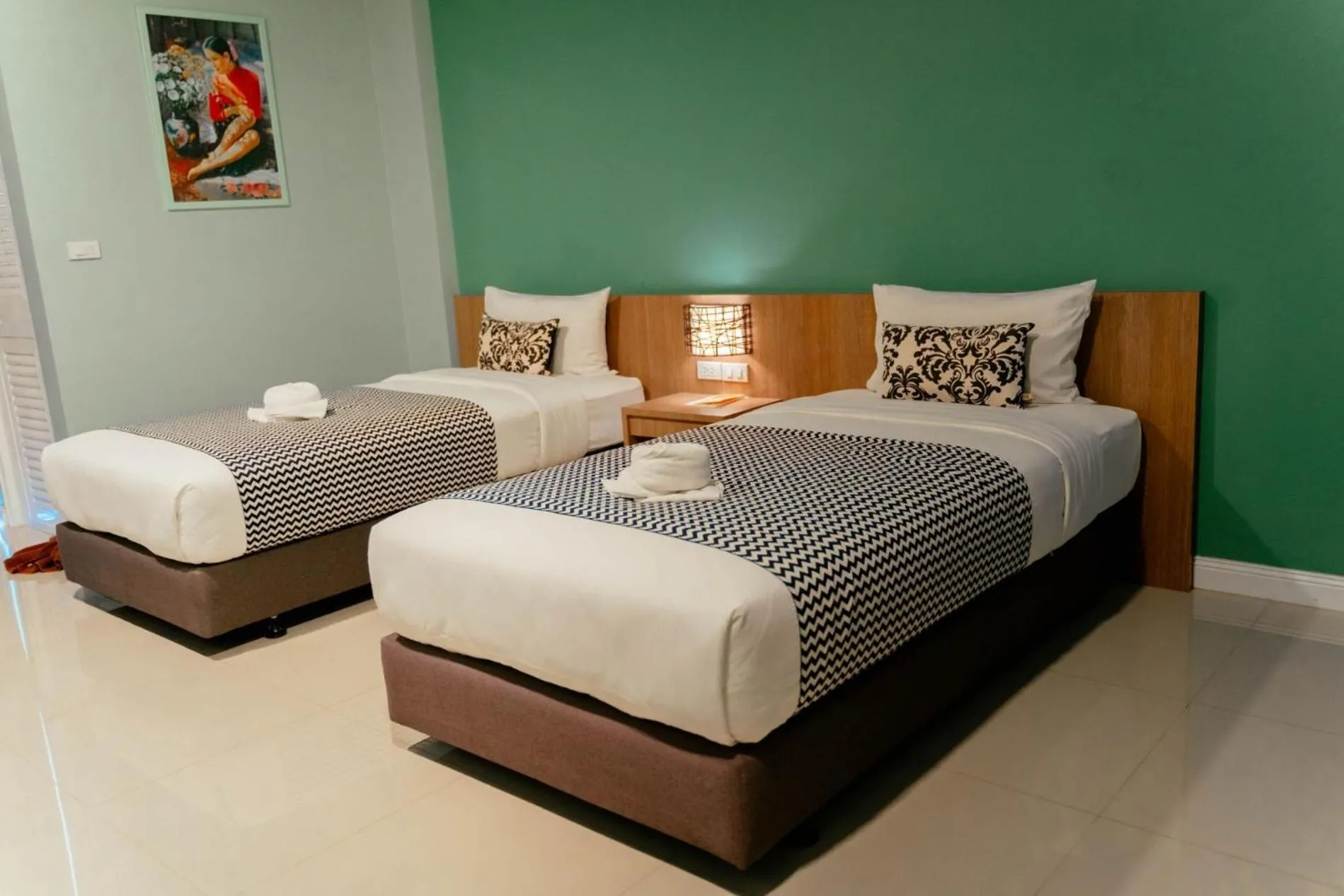 Photo of the whole room, Bed in It's me Keawanong Hotel