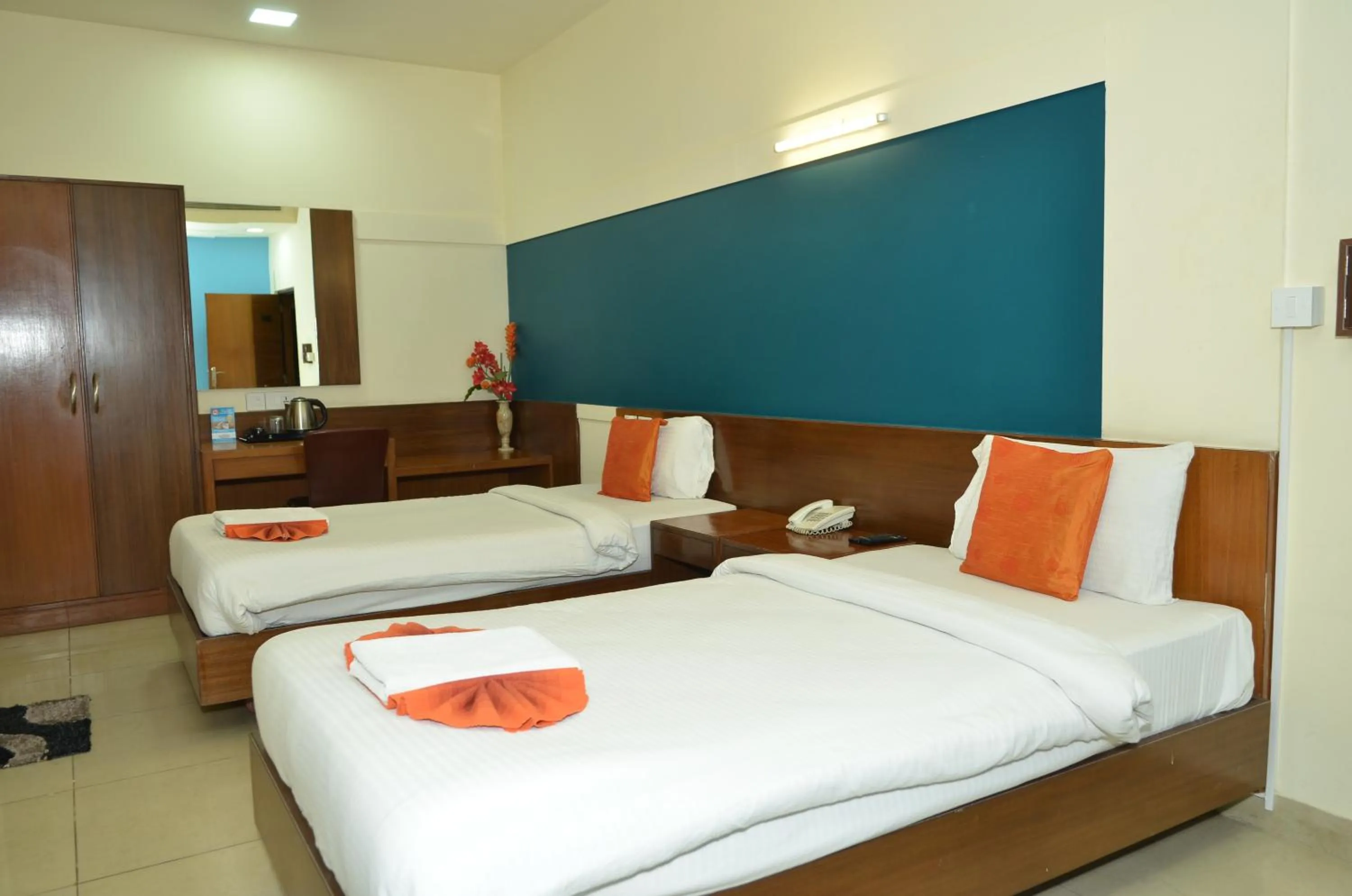 Bed in Cubbon Suites