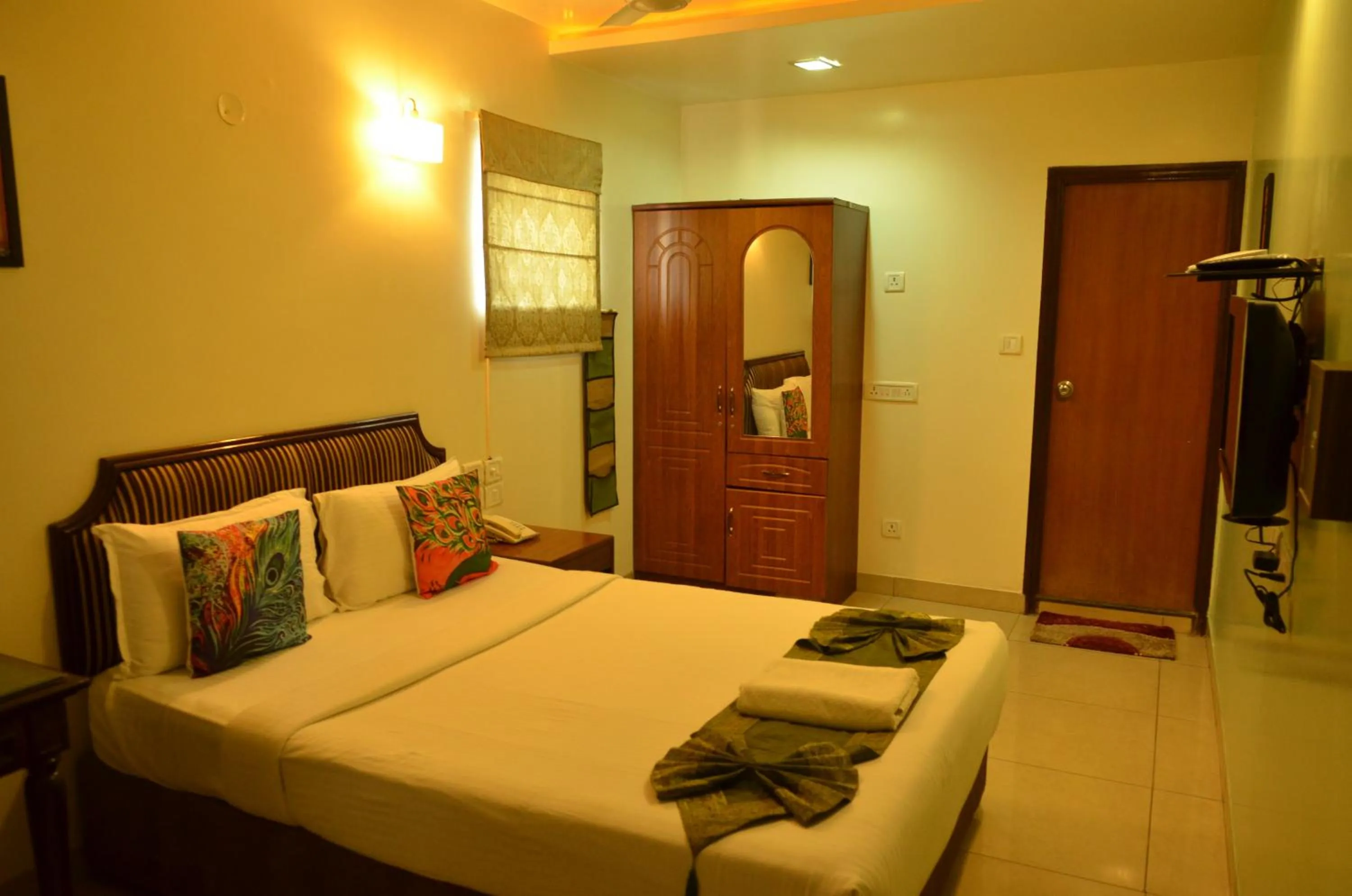 Bed in Cubbon Suites