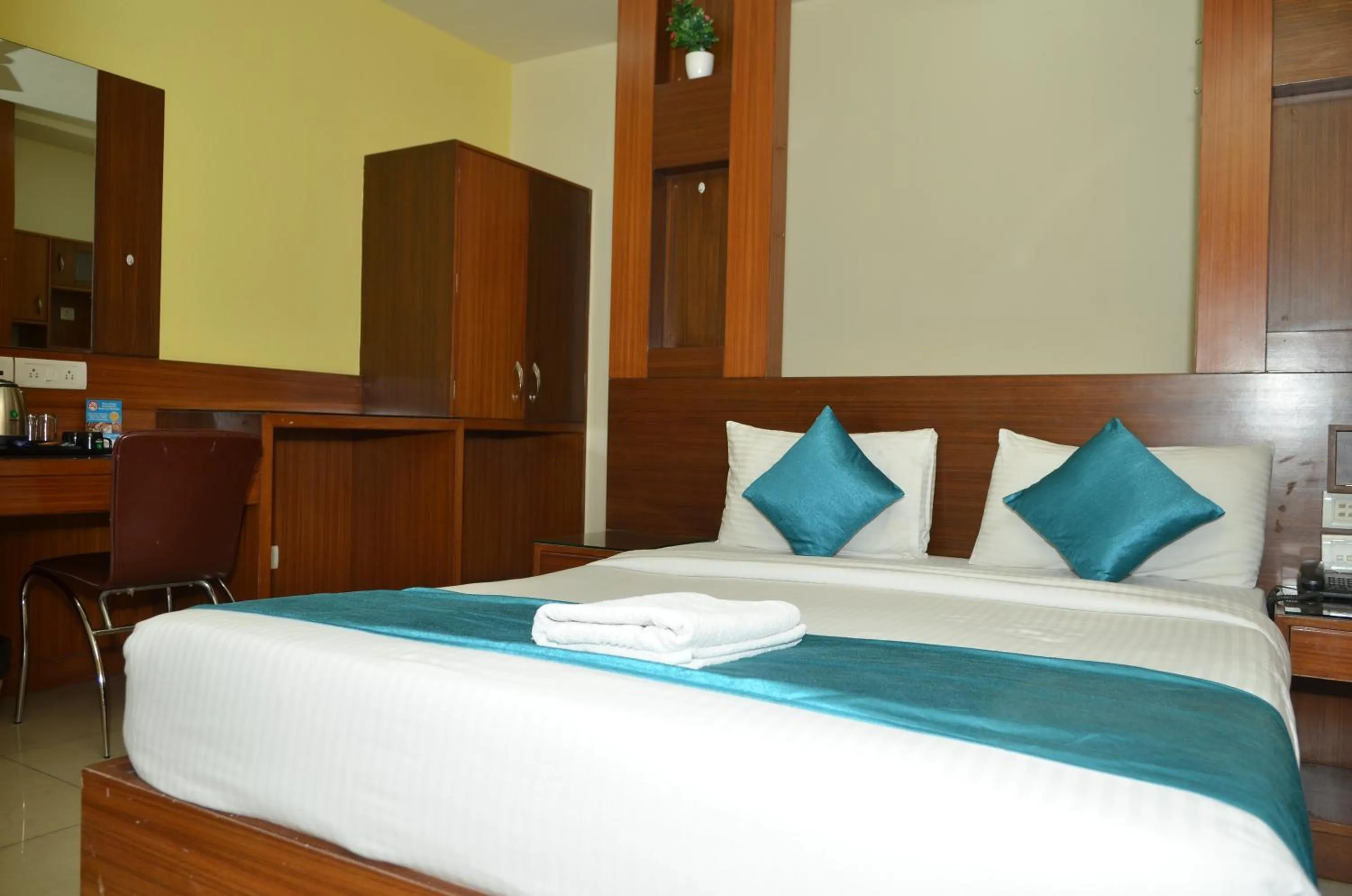Bed in Cubbon Suites