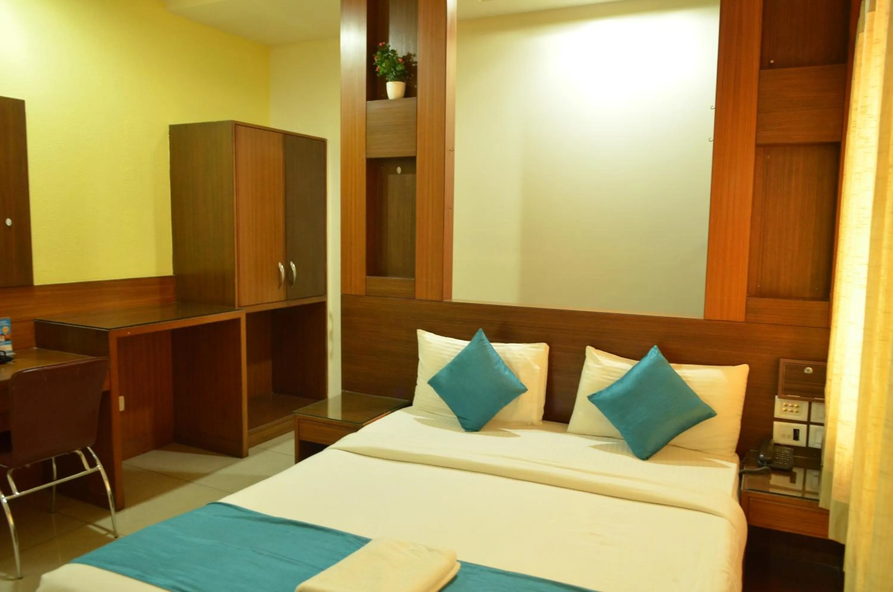 Bed in Cubbon Suites