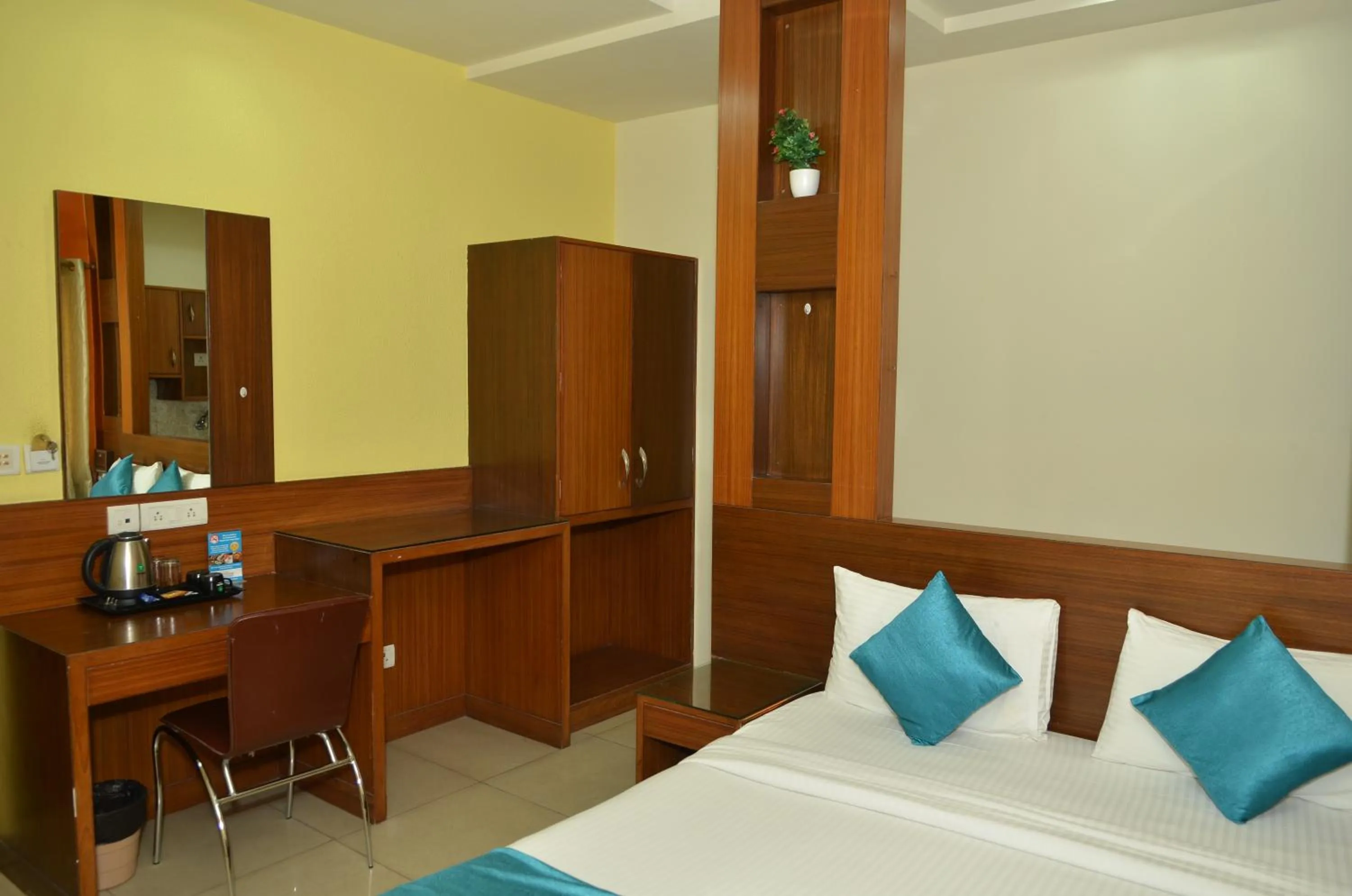 Bed in Cubbon Suites