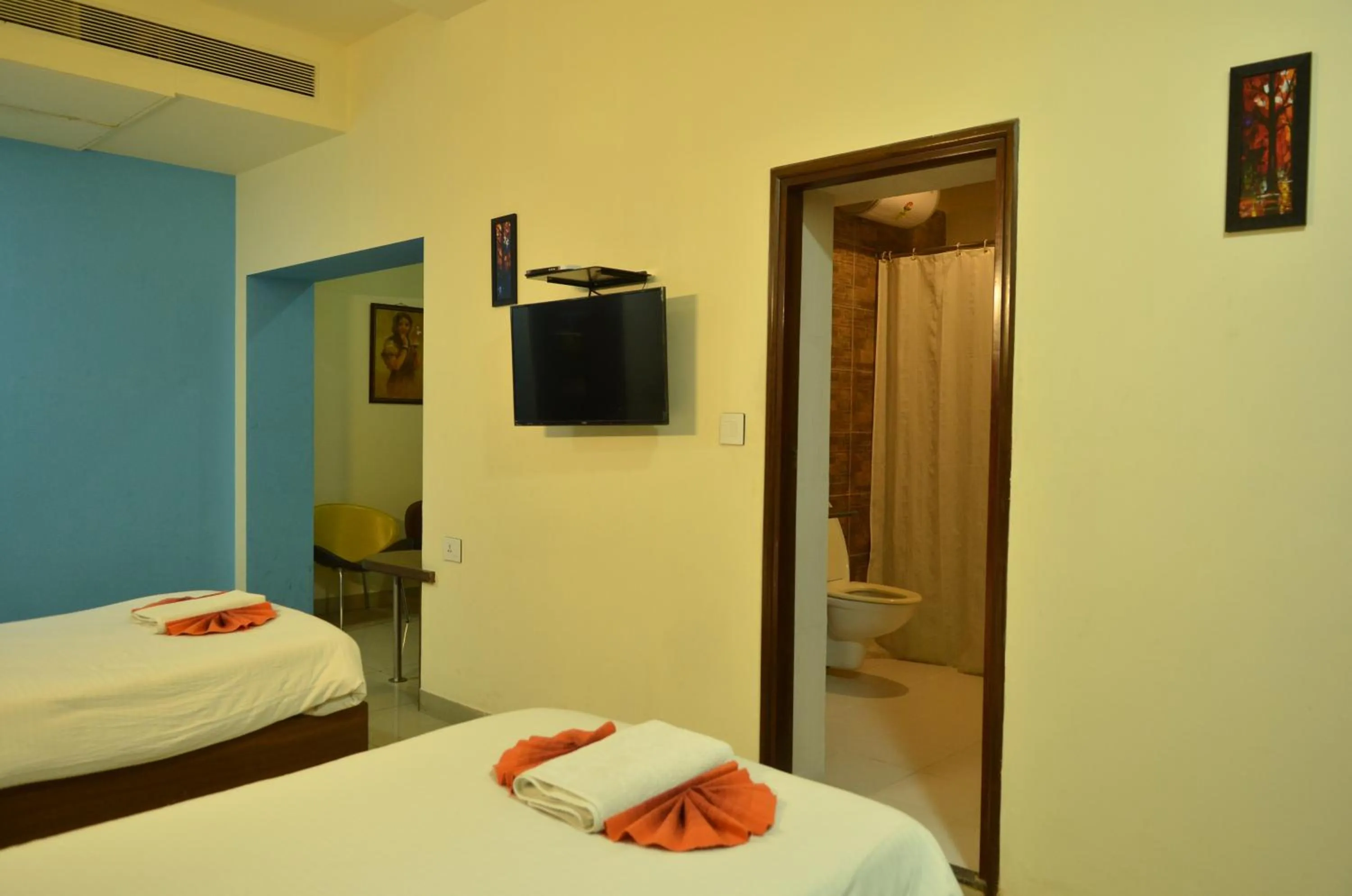 Bed in Cubbon Suites