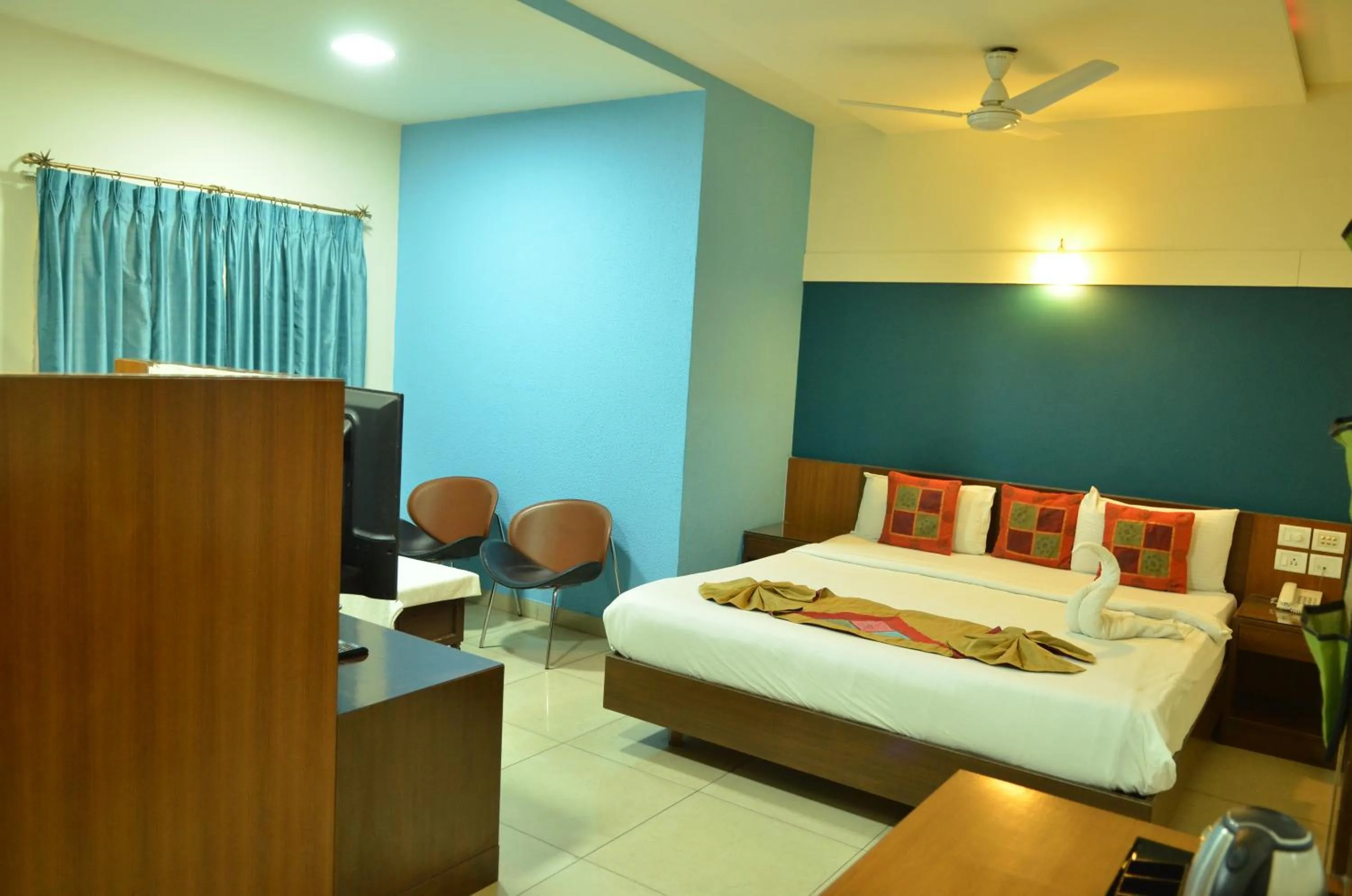 Bed in Cubbon Suites