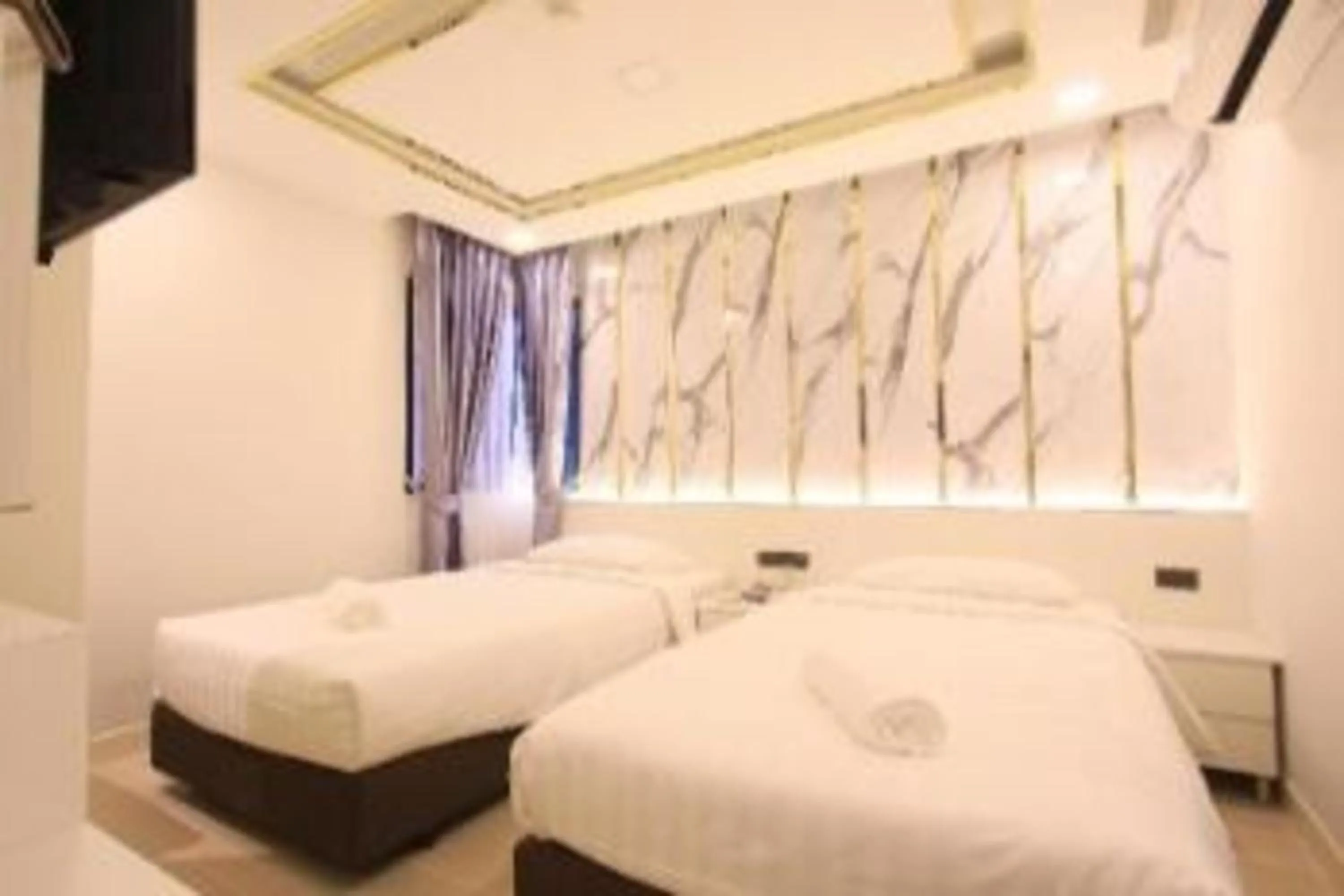 Bed in Pratunam Atrium Hotel