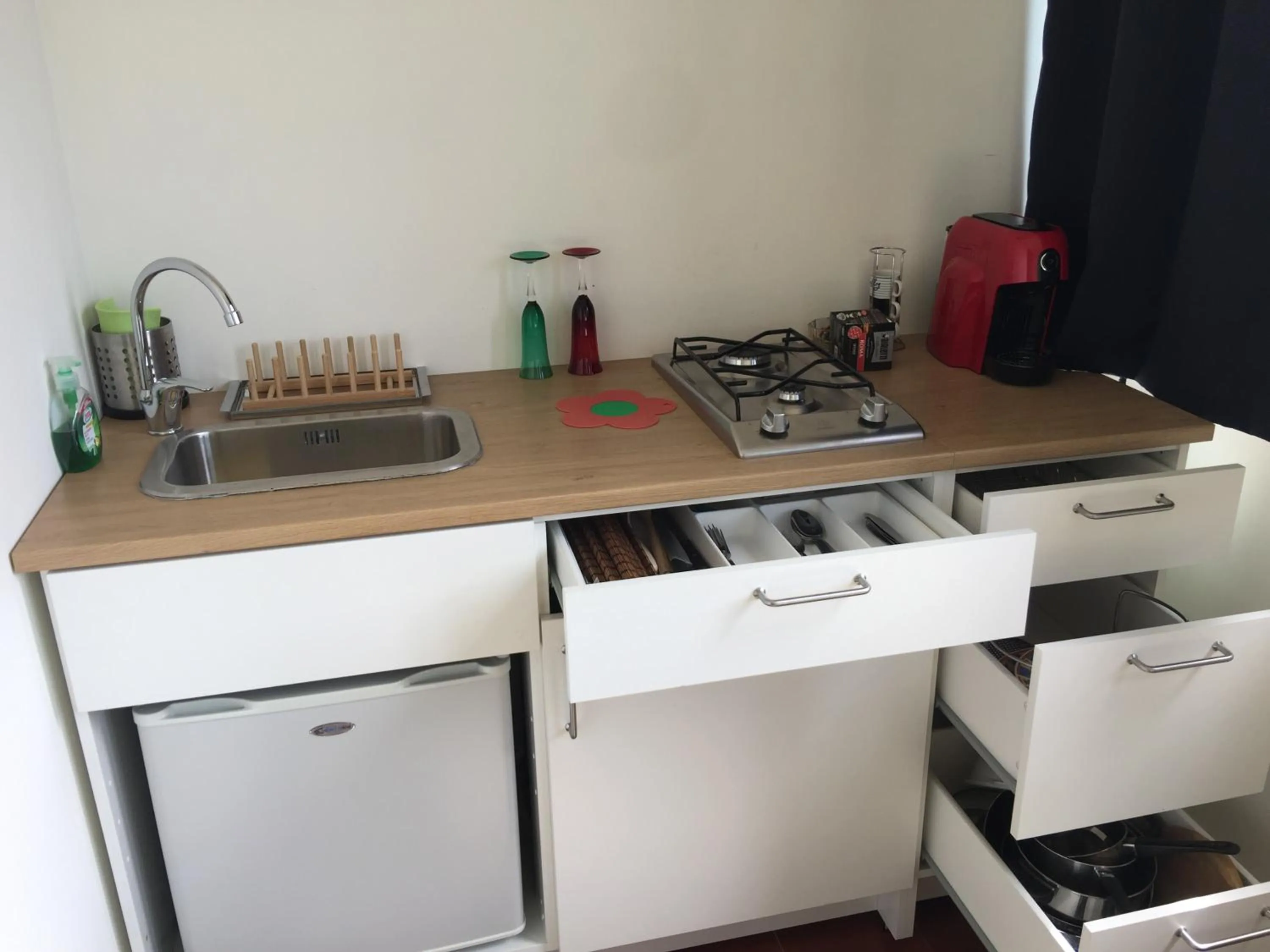 Kitchen or kitchenette in La Casa di Emanuella - Rooms & International Suites