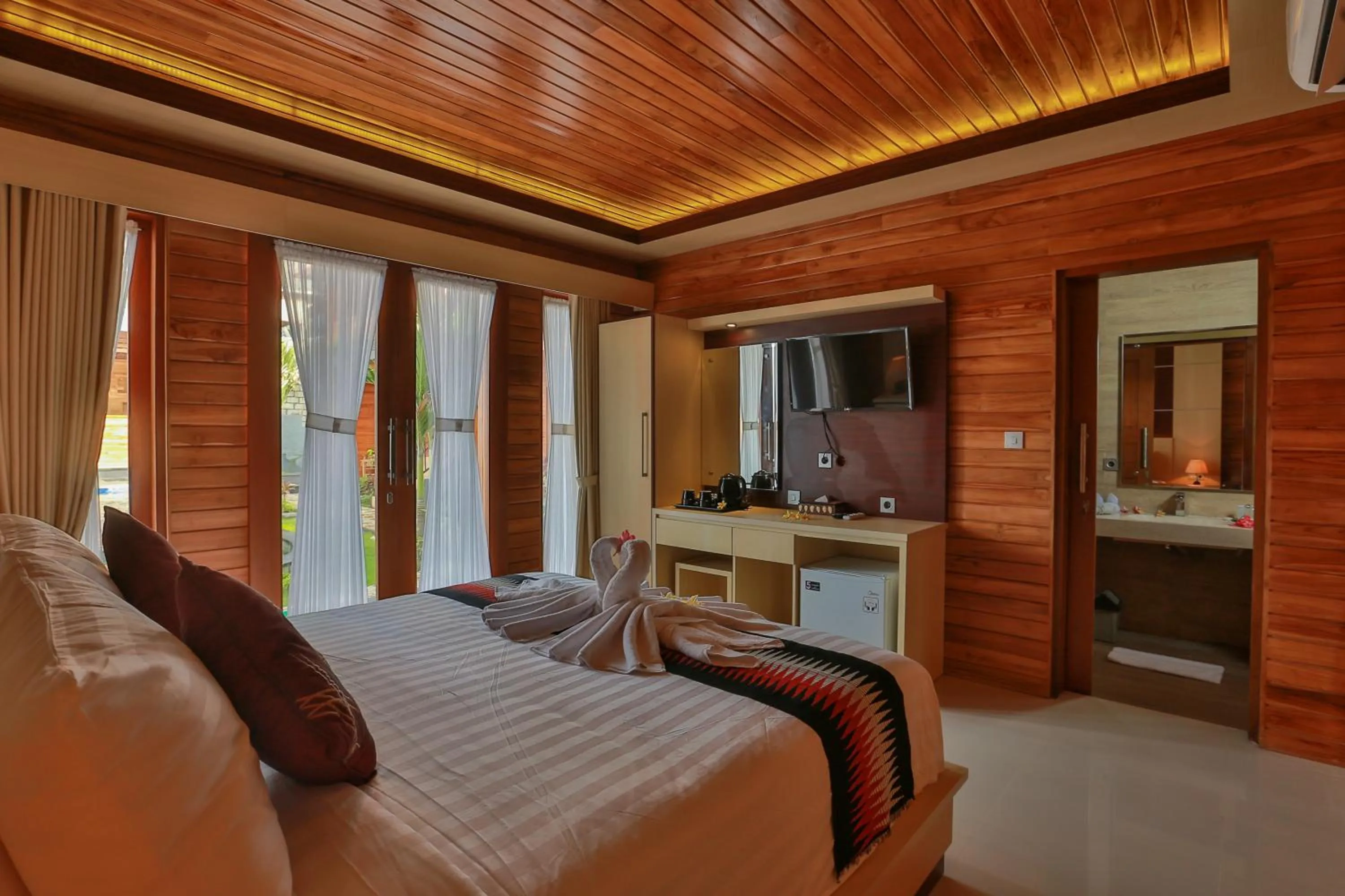 Bed in Sunrise Cottage