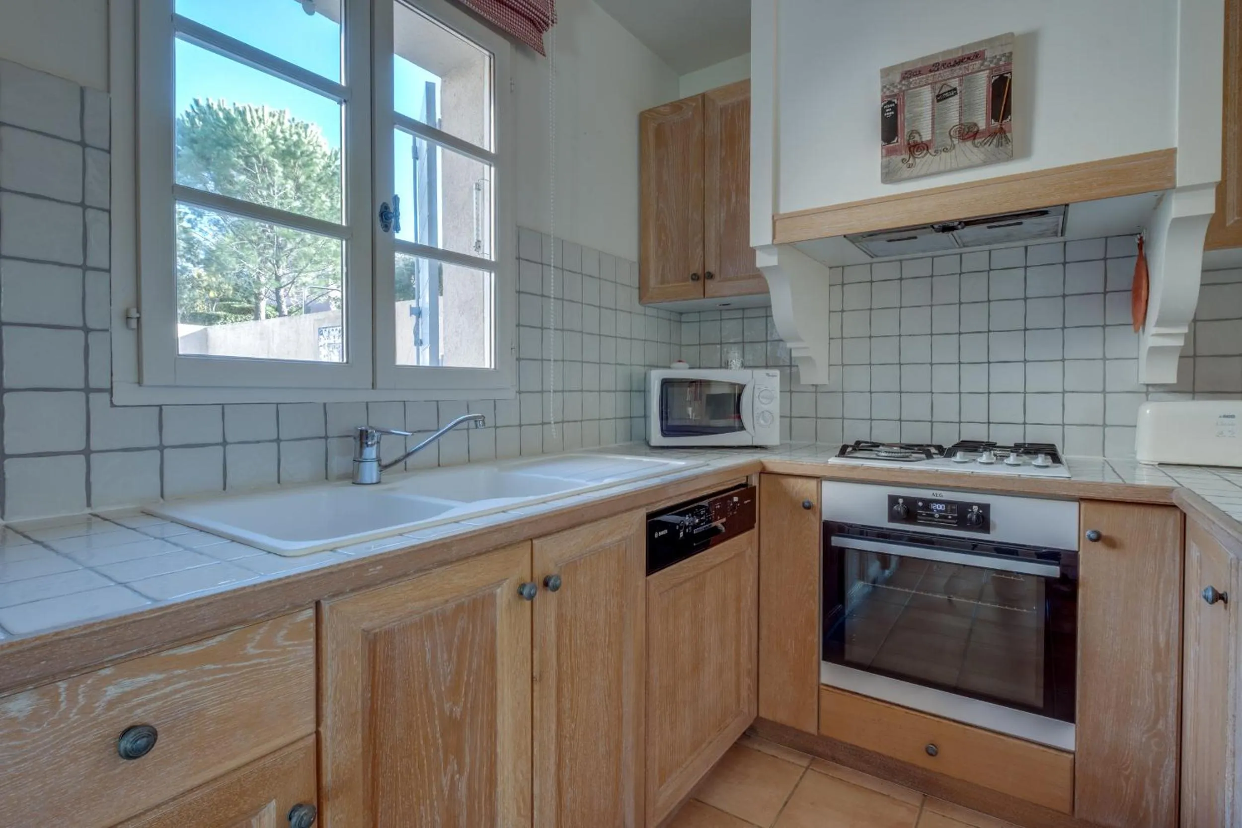 kitchen in Les Appartements et Maisons du Domaine de Saint Endréol Golf & Spa Resort