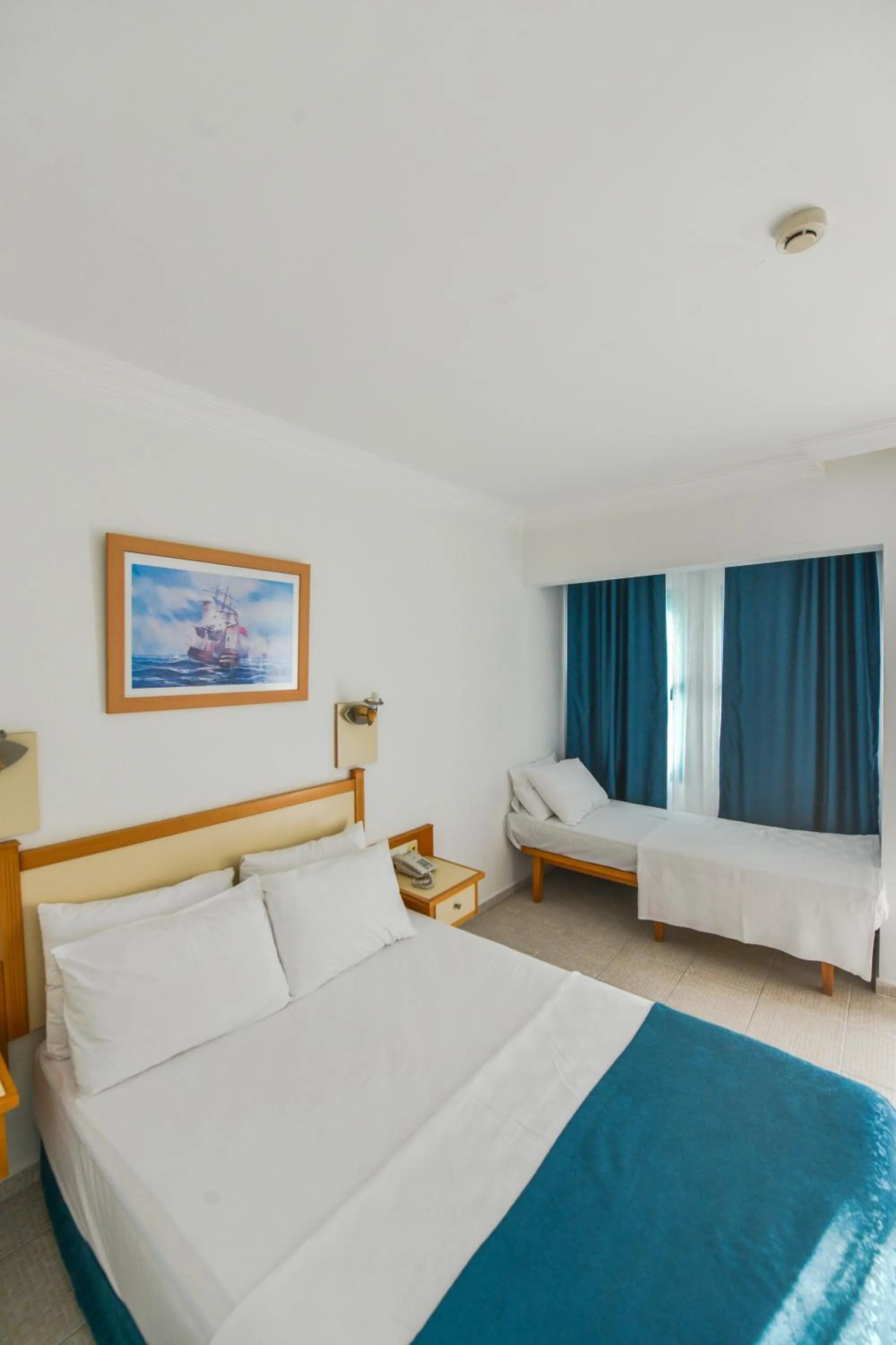 Bed in Rebin Beach Hotel