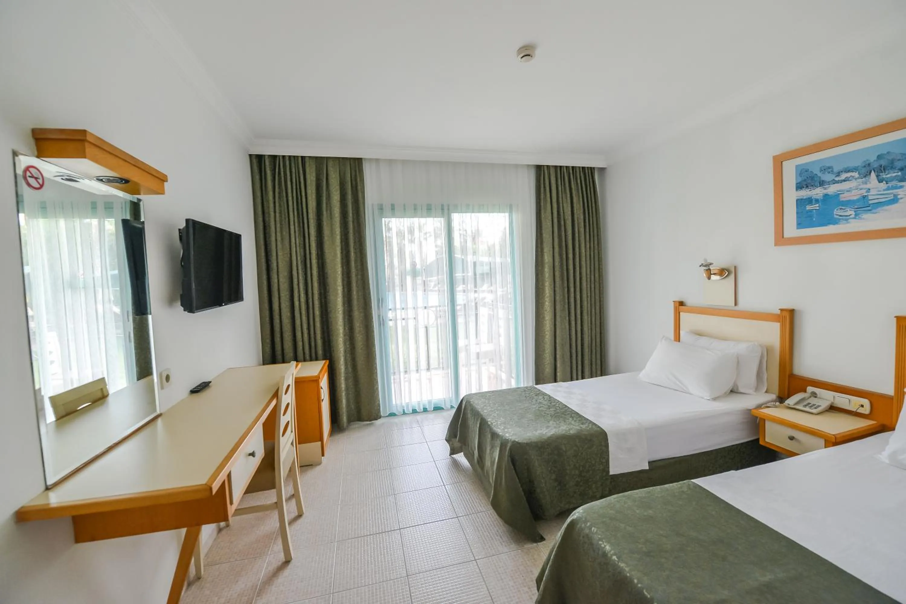 Bed in Rebin Beach Hotel