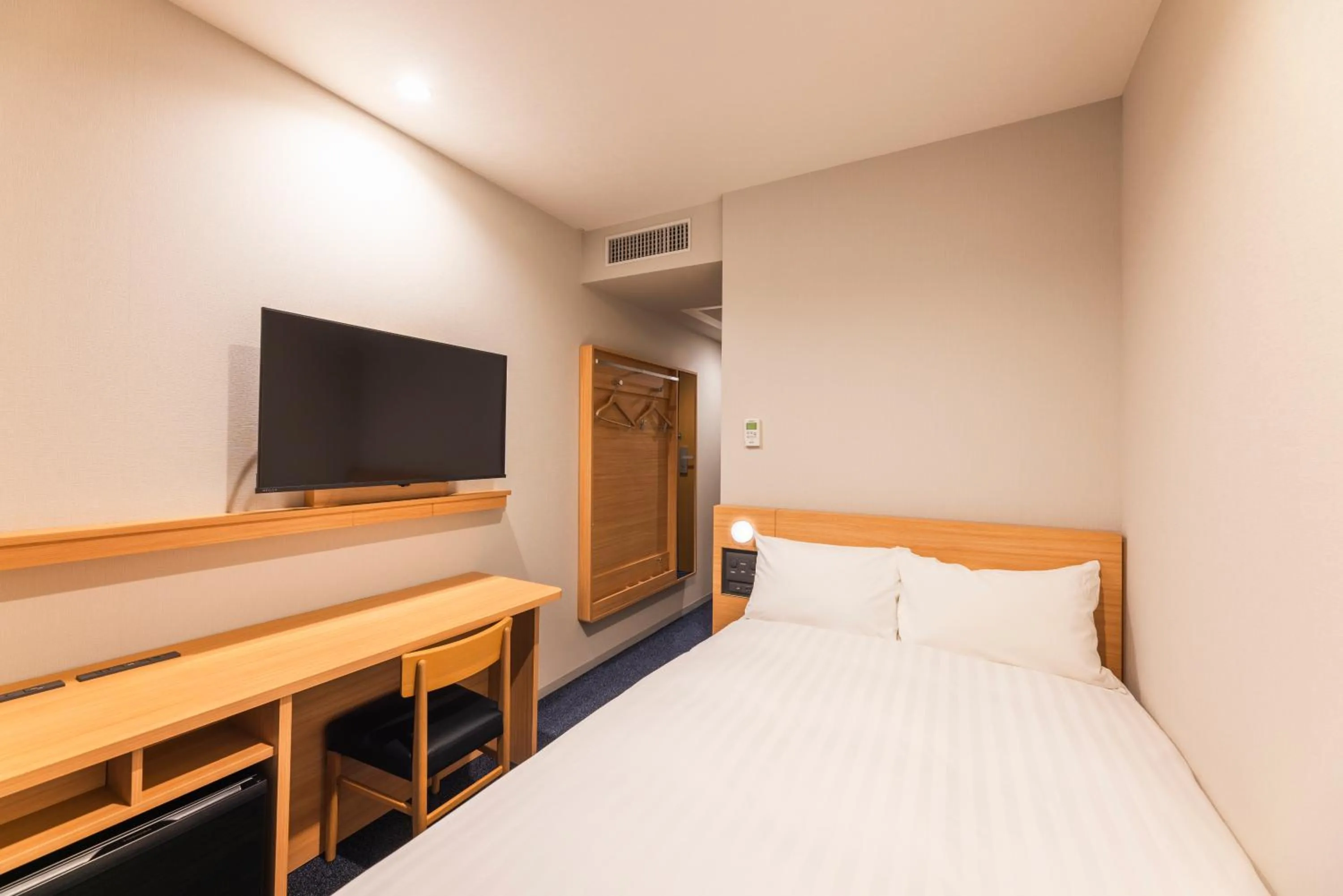 Bed in Sotetsu Fresa Inn Nagano-Ueda