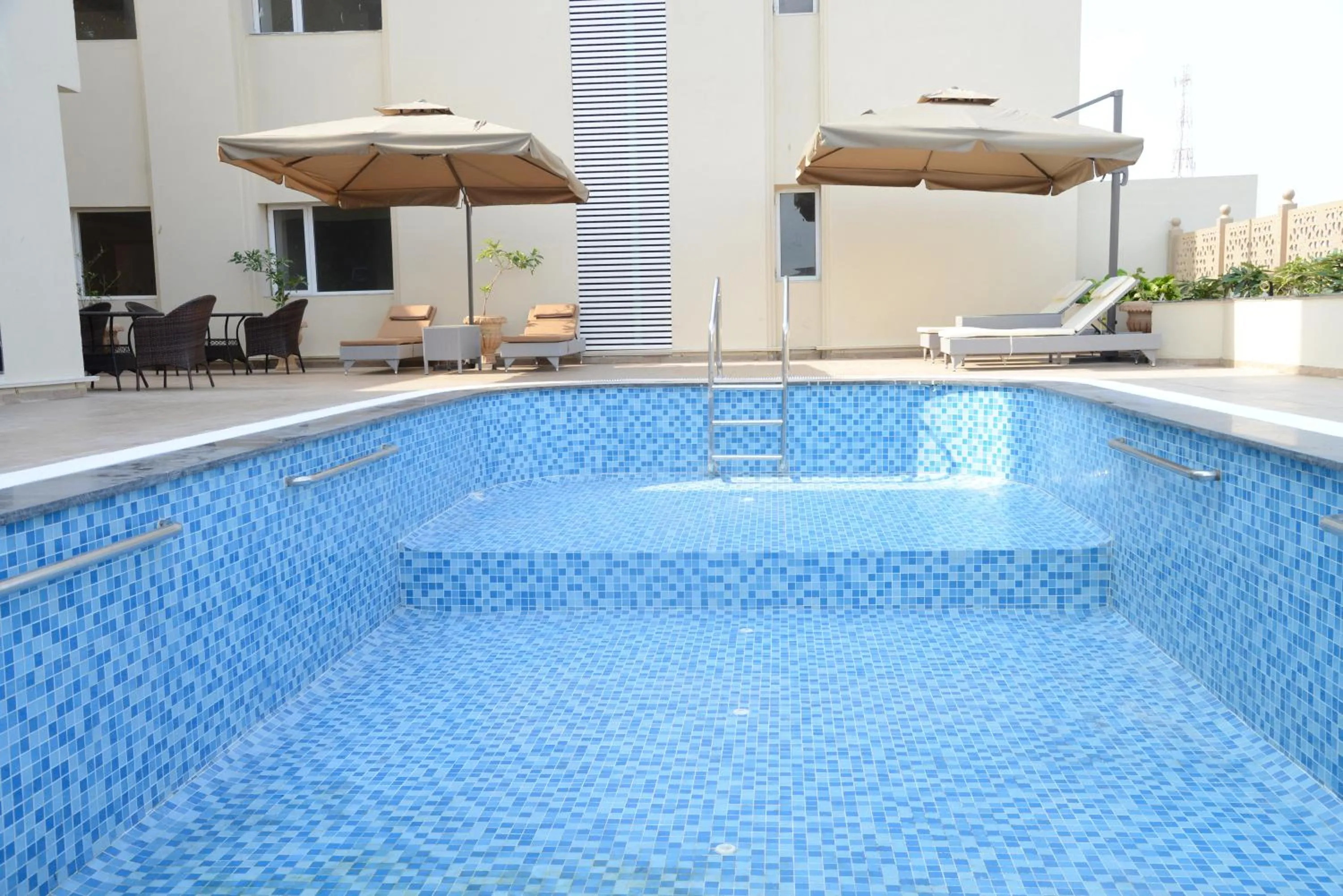 Swimming pool in Lords Inn Jamnagar -Motikhavdi