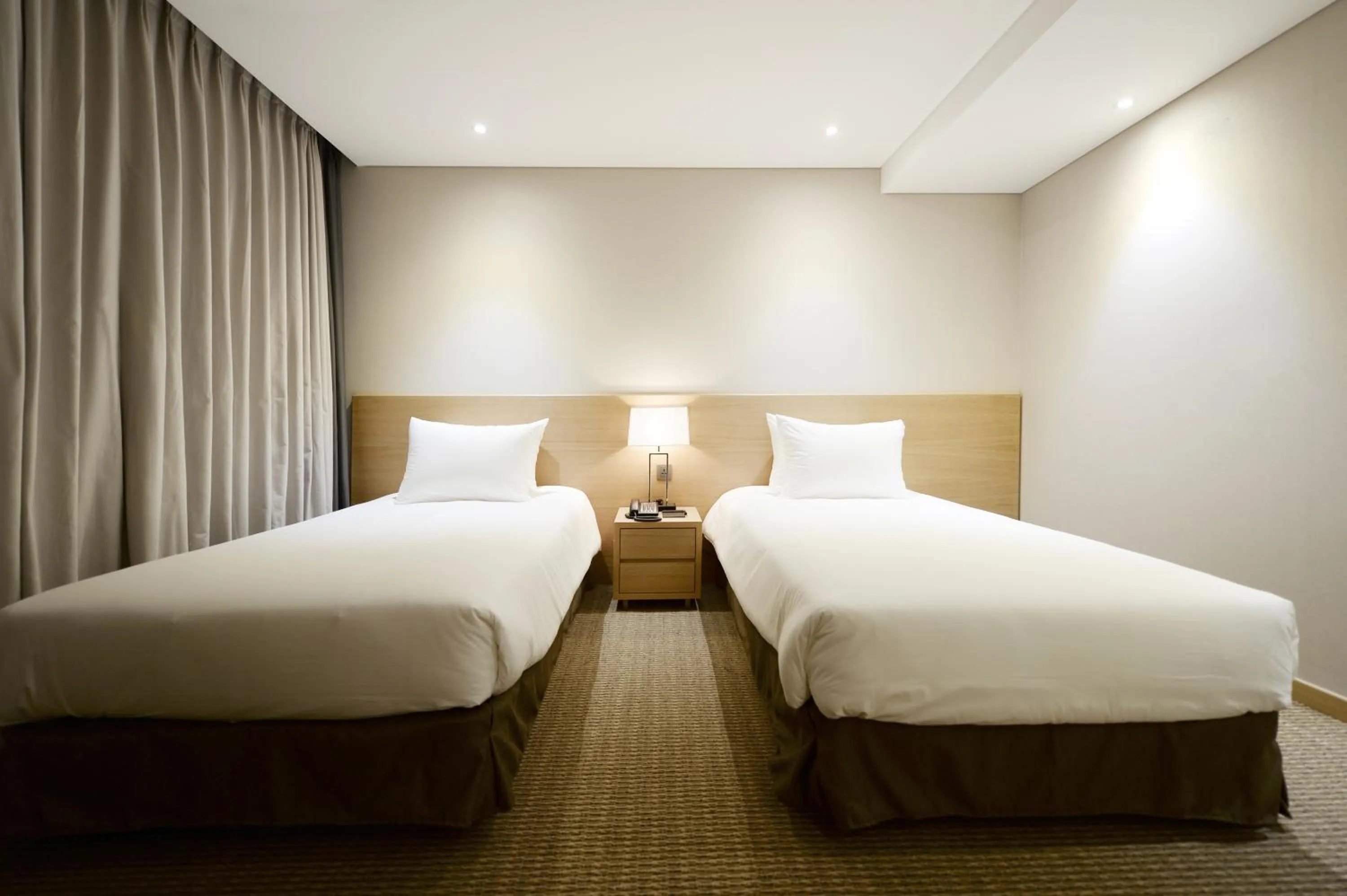 Bed in Hotel New Oriental Myeongdong
