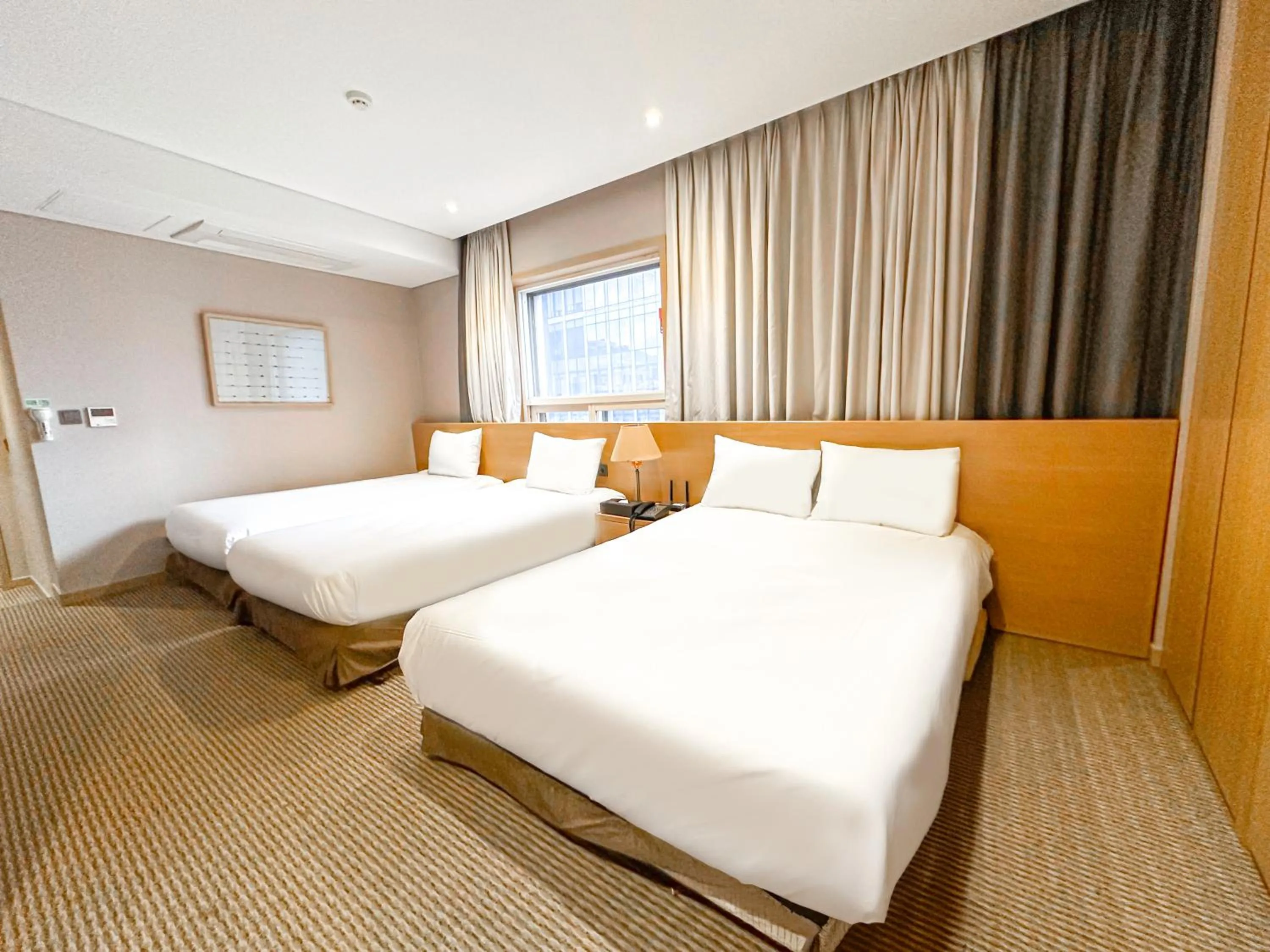 Bed in Hotel New Oriental Myeongdong