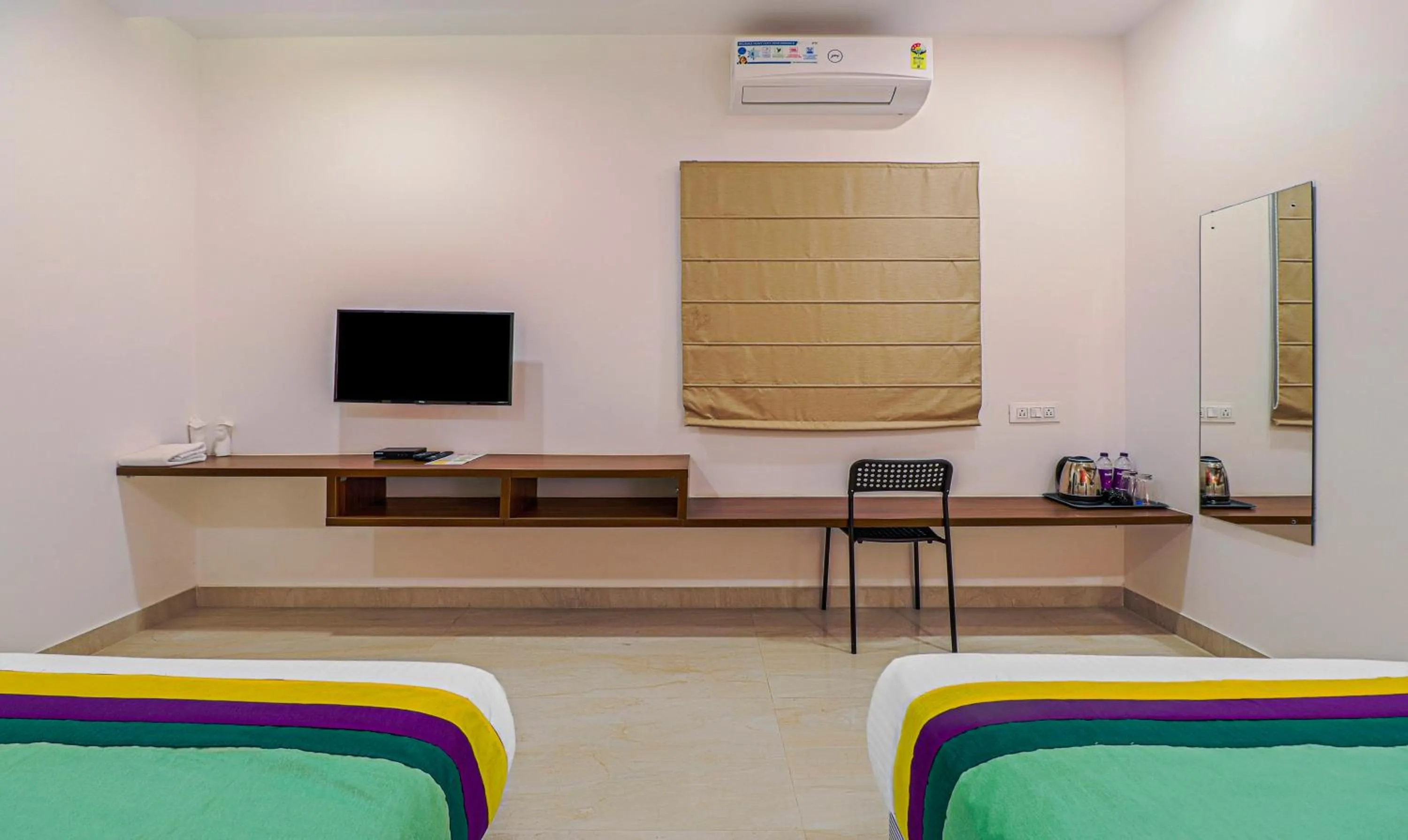 TV and multimedia in Treebo YC Grand Boutique, Electronic City