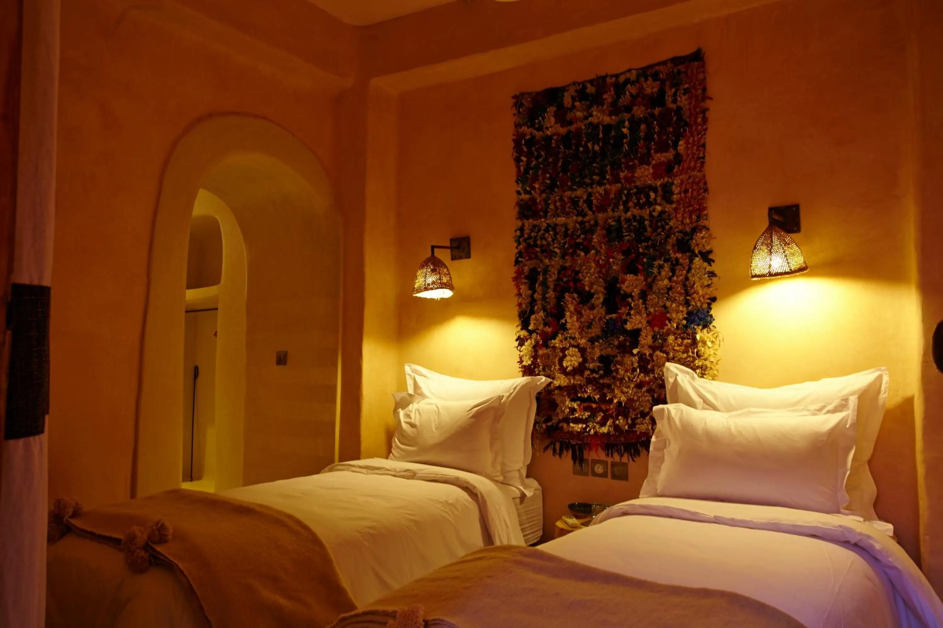 Bed in Riad Caravane