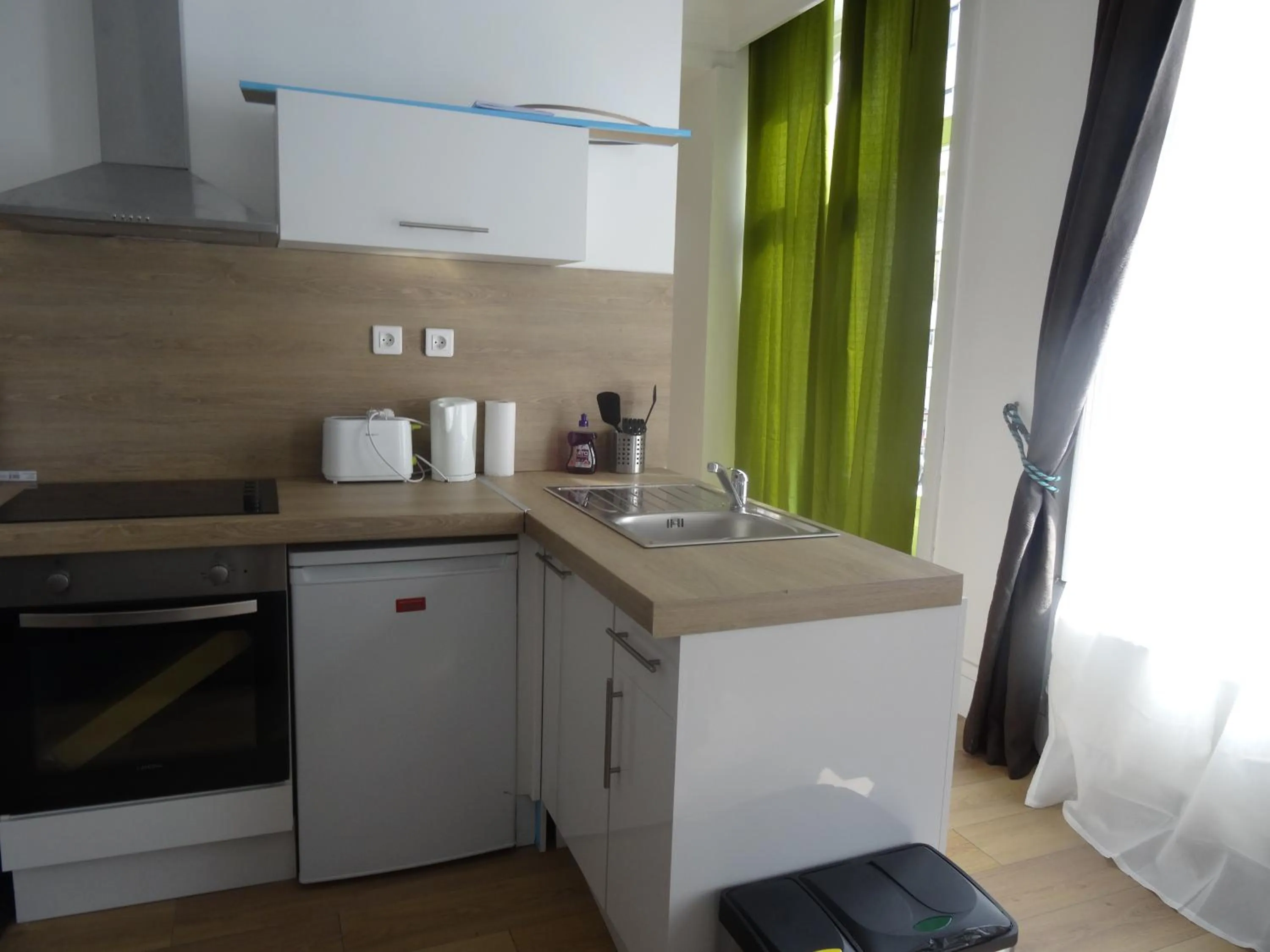 Kitchen or kitchenette in Nationale Appart Hotel