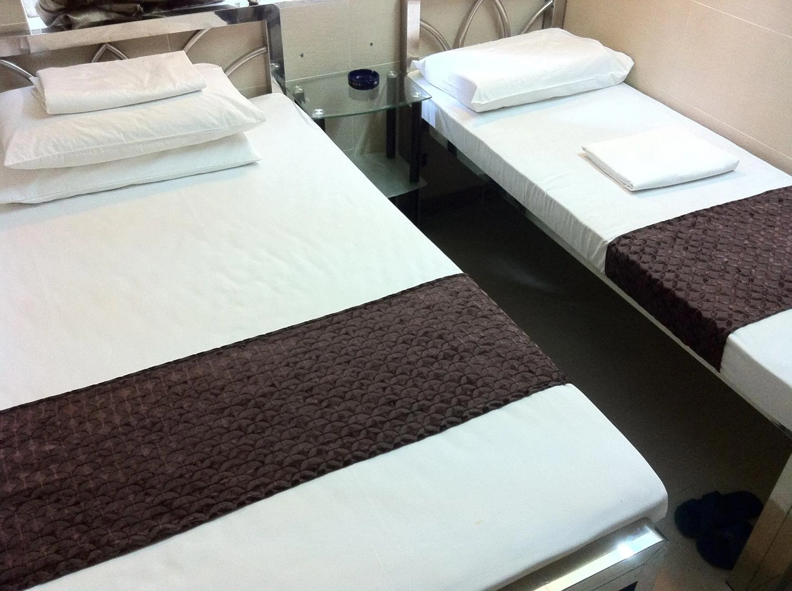 Bed in New Grand Guest House