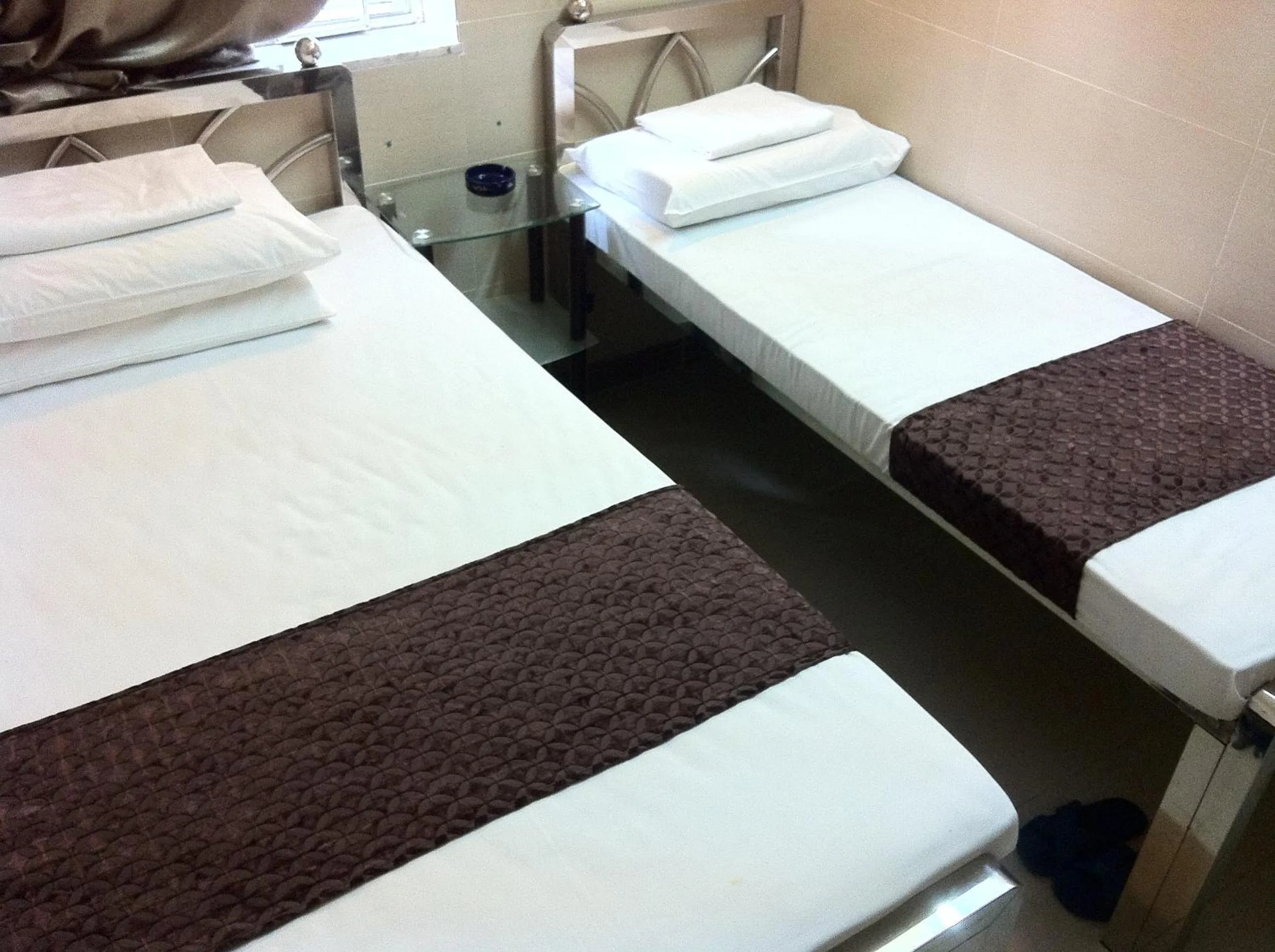 Bed in New Grand Guest House