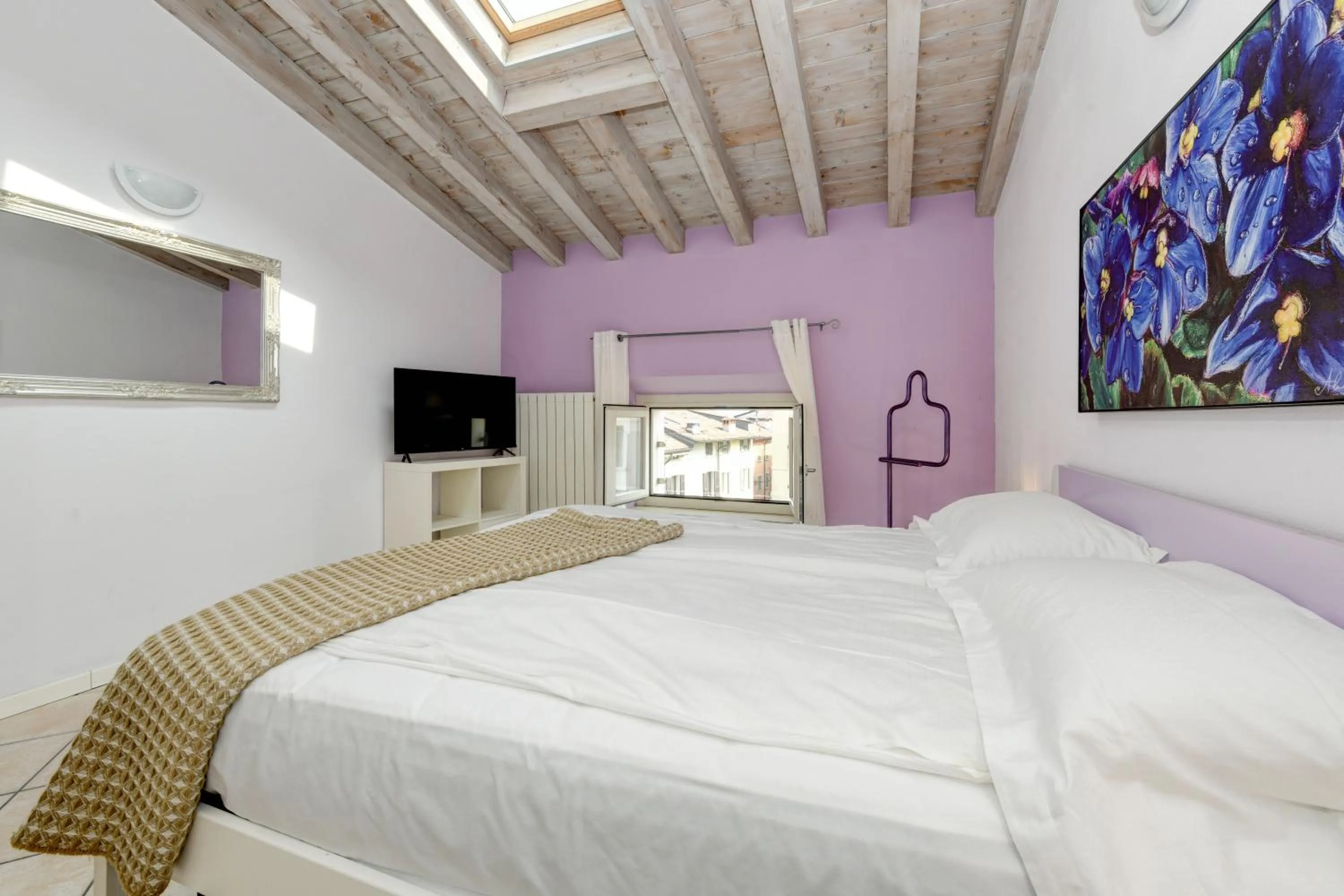 Bed in Flowers Apartments